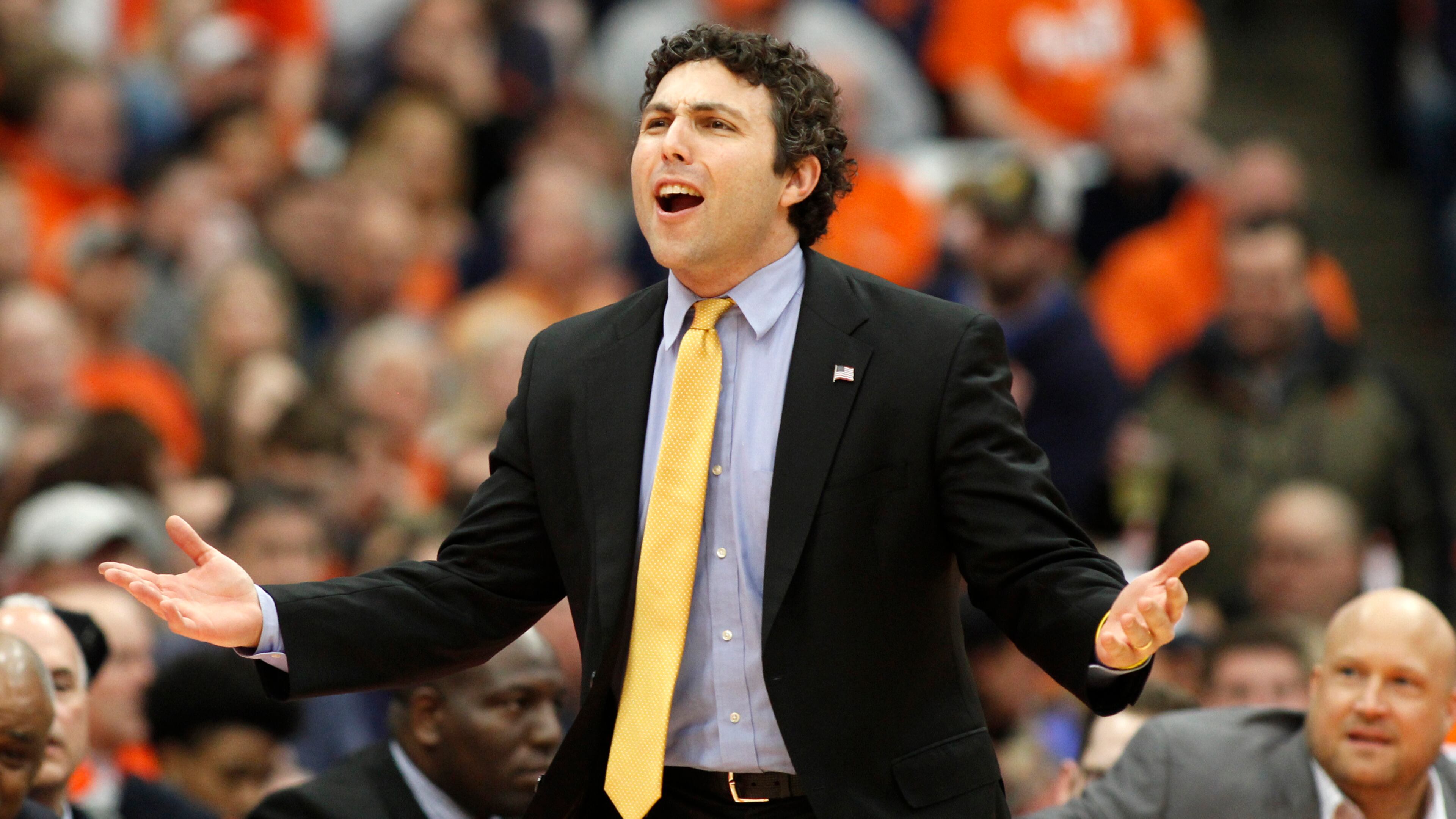 Georgia Tech coach Josh Pastner yells to an official about a call in the first half of an NCAA college basketball game against Syracuse in Syracuse, N.Y., Saturday, March 4, 2017. (AP Photo/Nick Lisi)