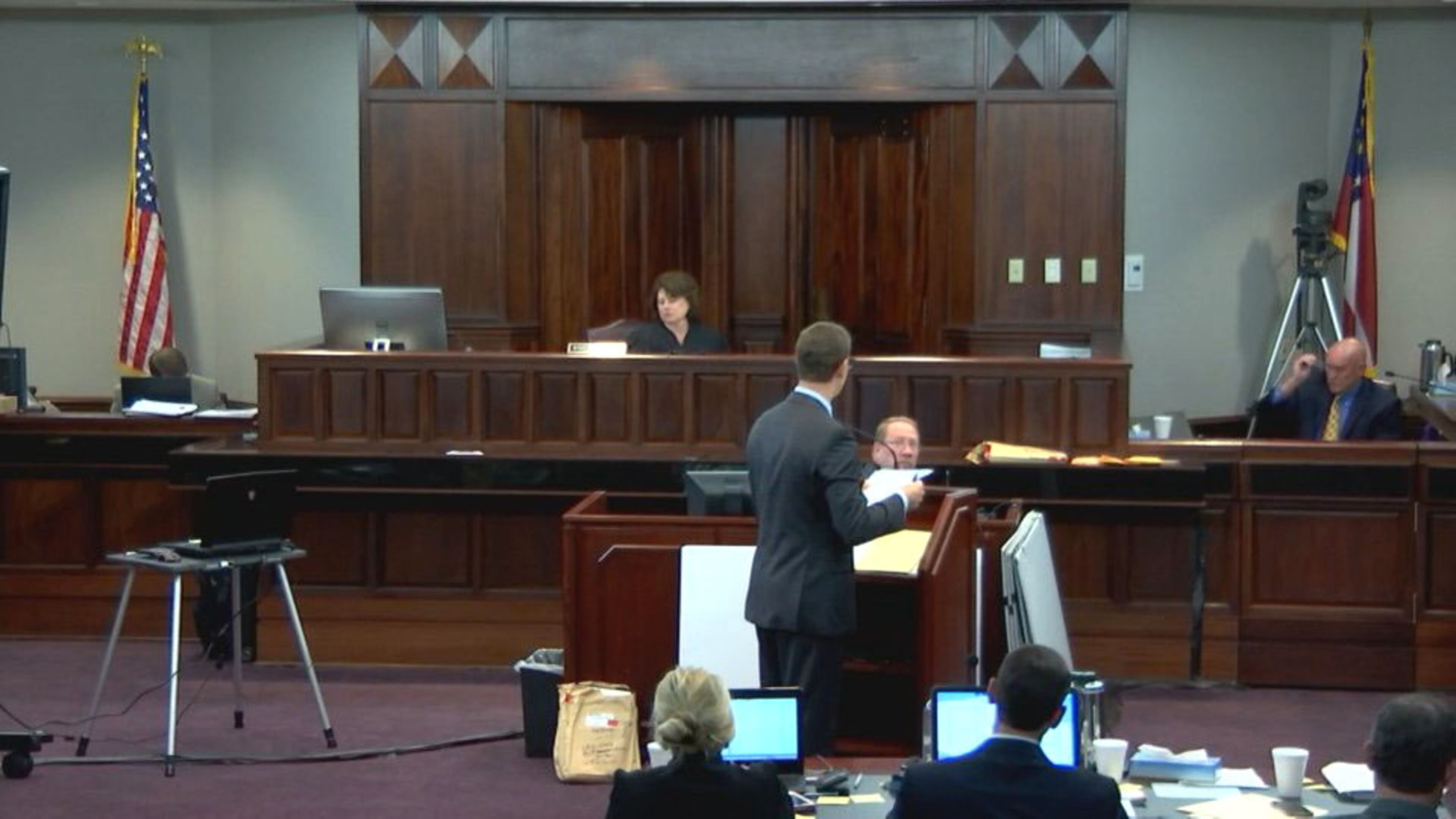 Defense attorney Carlos Rodriguez (center) cross examines former Cobb County detective Ray Yeager during Justin Ross Harris' murder trial at the Glynn County Courthouse in Brunswick, Ga., on Wednesday, Oct. 13, 2016. (screen capture via WSB-TV)
