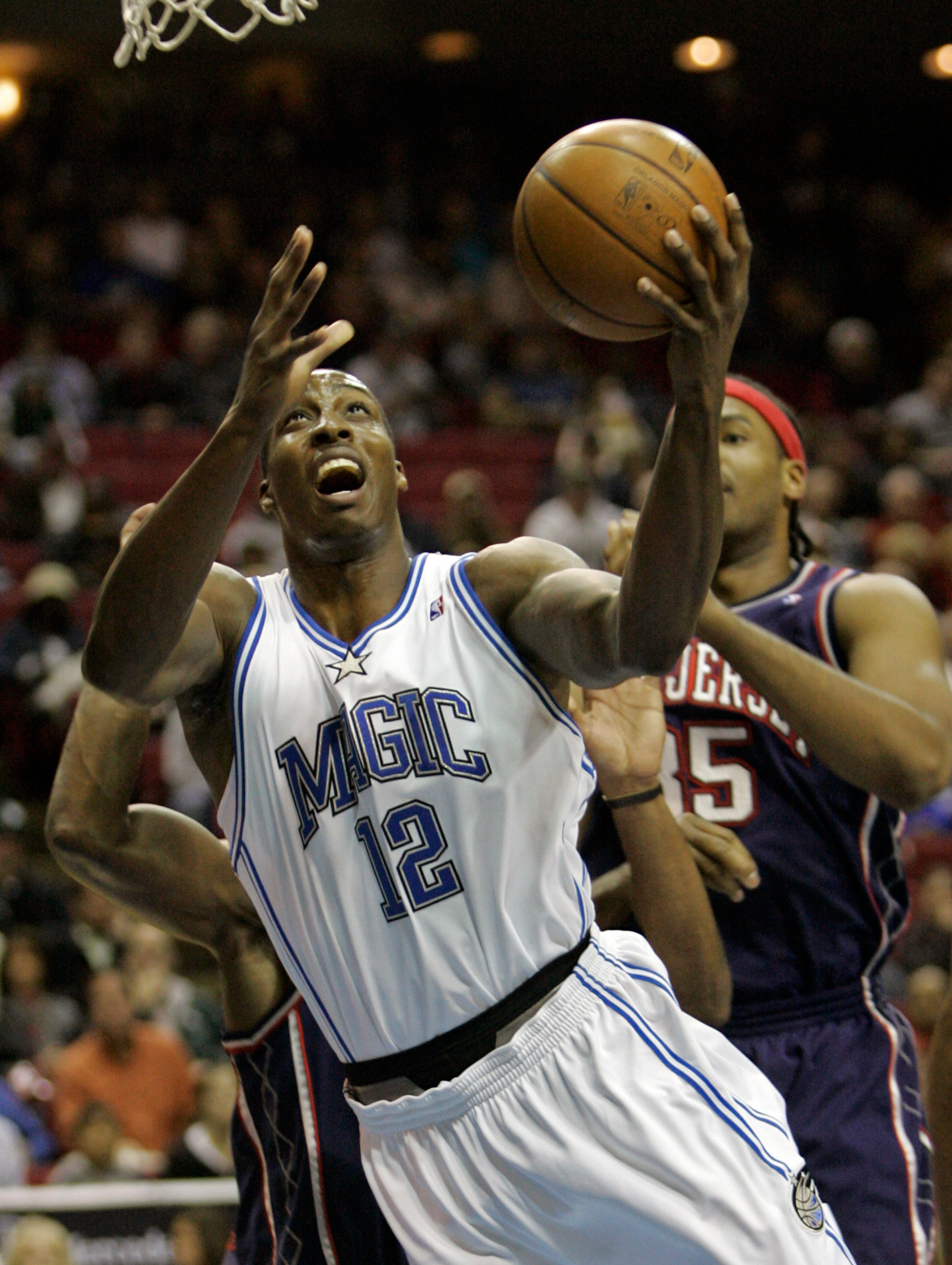 Atlanta elementary school students with perfect attendance won $1,164 worth of jerseys for the Orlando Magic, the team where Howard’s famous nephew Dwight Howard (12, above) played for eight years. - Text by Willoughby Mariano, AJC