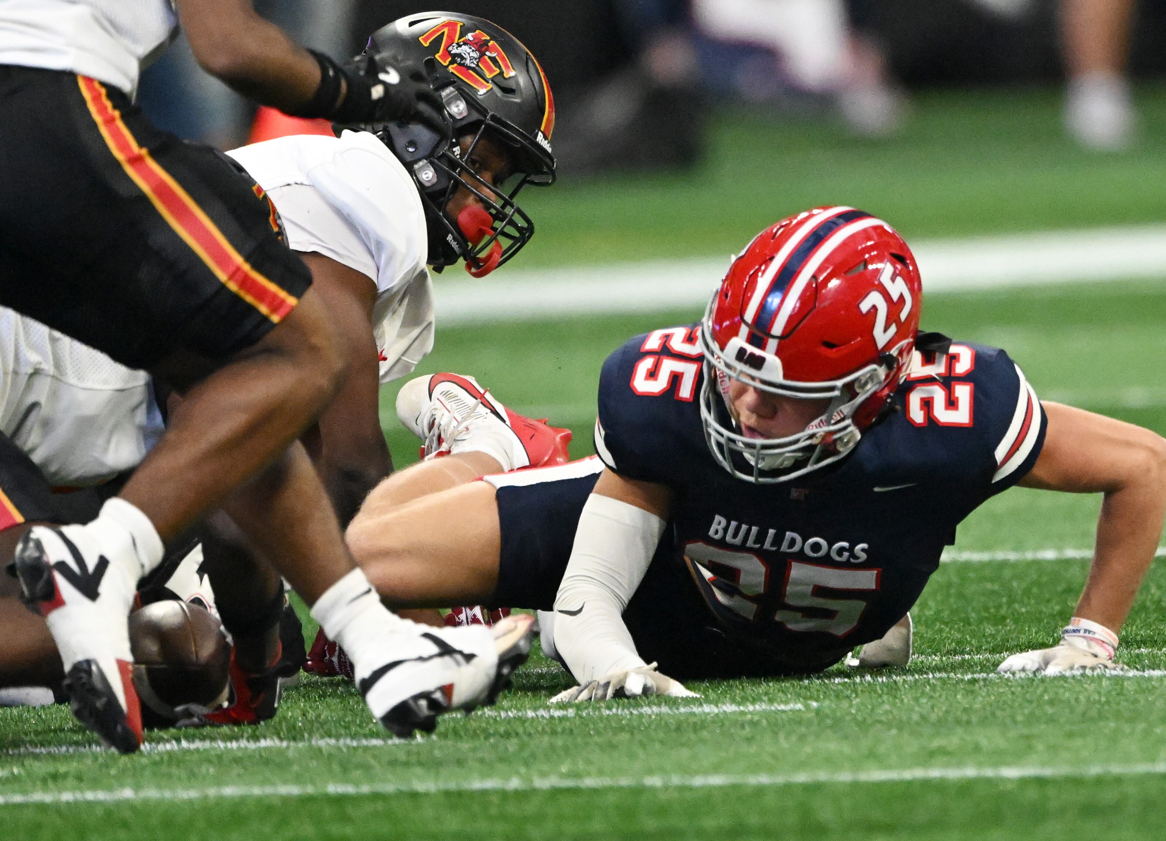 Toombs County's wide receiver Gavin Fletcher (25) fumbles the ball during the first half in GHSA Class A-Division State Championship game at Mercedes-Benz Stadium, Tuesday, December 17, 2024, in Atlanta. (Hyosub Shin / AJC)