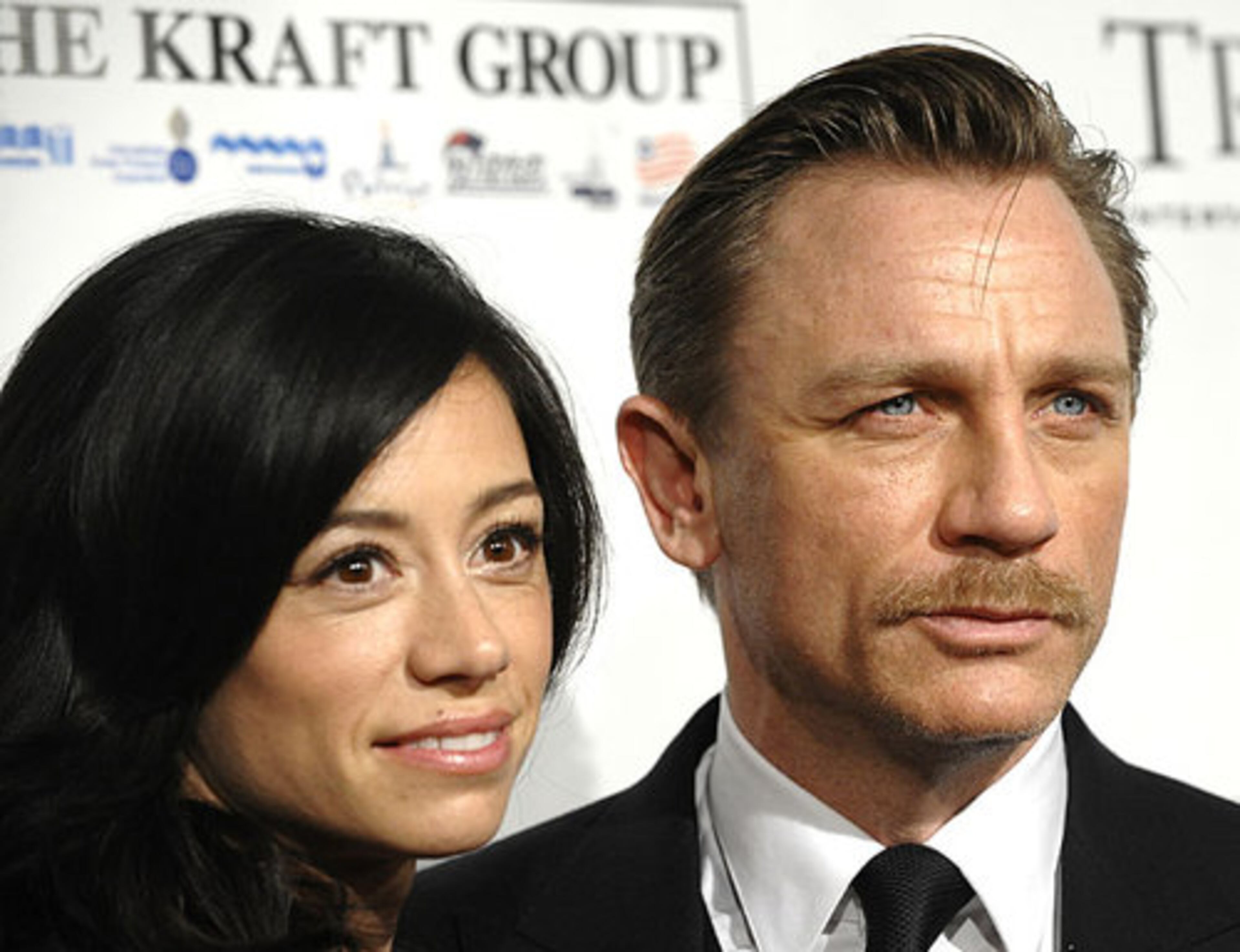 Film producer Satsuki Mitchell, her boyfriend, actor Daniel Craig, and Daniel Craig's mustache.