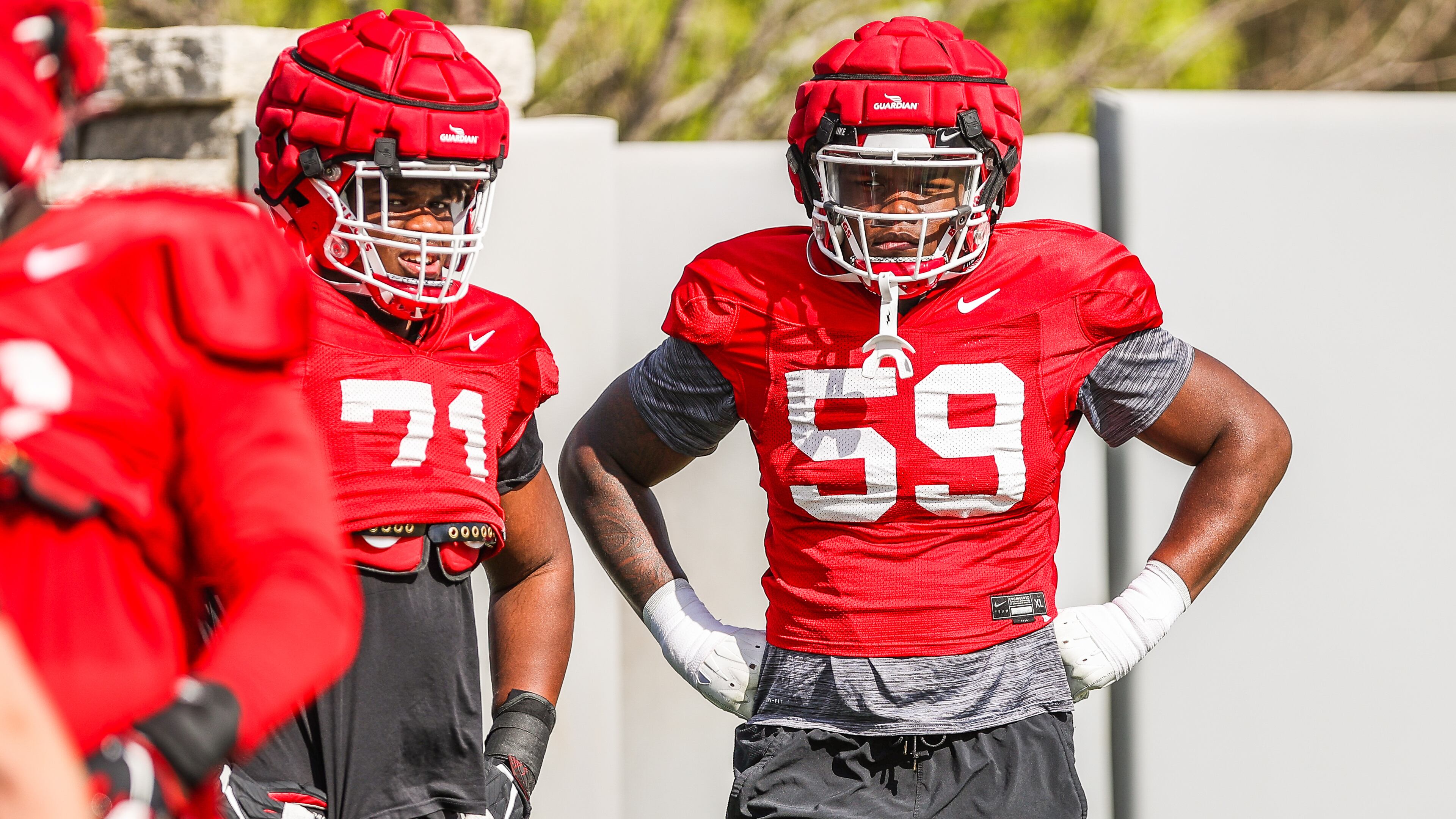 Georgia's Broderick Jones (59) won the battle this spring for the honor to play left tackle for the Bulldogs in 2022. After the departure of Amarius Mims via the transfer portal, freshman Earnest Greene (71) stands as the next man up heading into Saturday's G-Day game. (Mackenzie Miles/UGA Athletics)