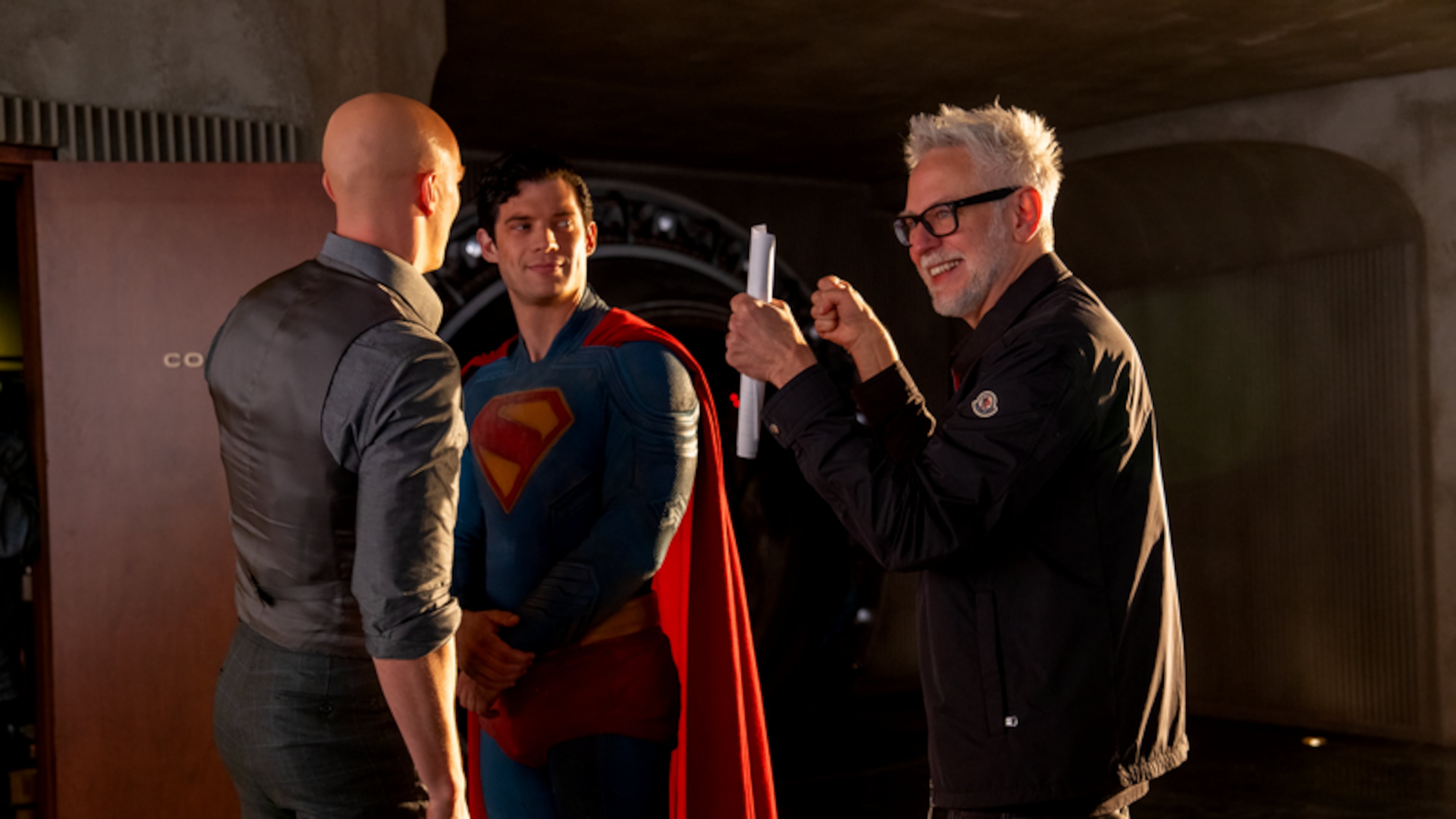 DC Studios co-CEO and director James Gunn (right) works with actors David Corenswet (center) and Nicholas Hoult on the set of "Superman," which generated $616 million in worldwide box office gross this summer. (Courtesy of Warner Brothers)