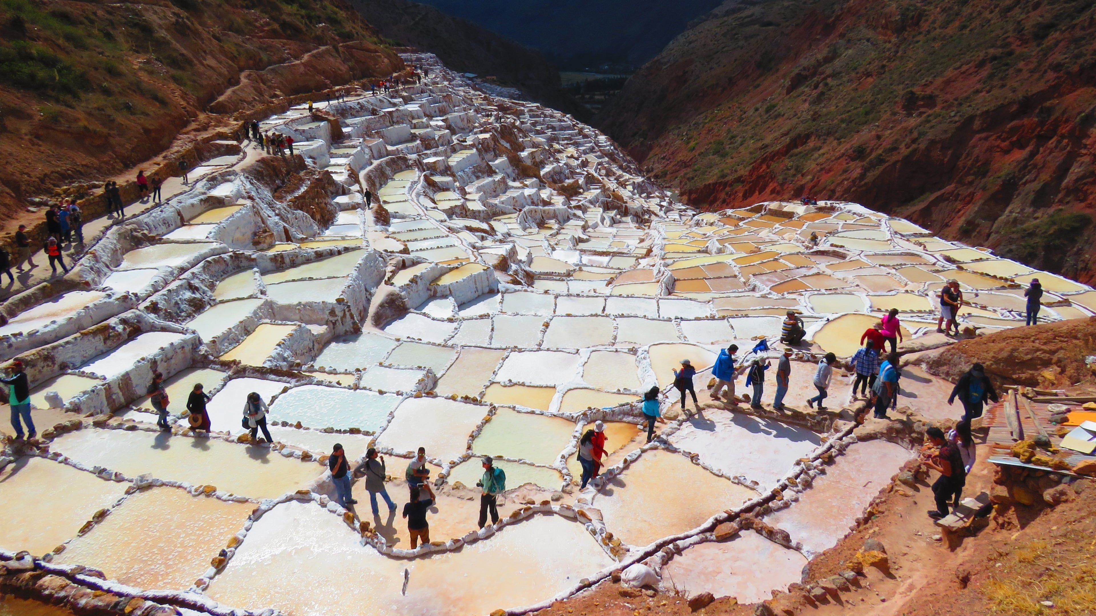 The Salt Pans in Maras, Peru, include more than 3,000 terraced pools fed by an underground spring where salt is harvested using pre-Incan methods. (Courtesy of Museum of Design Atlanta)