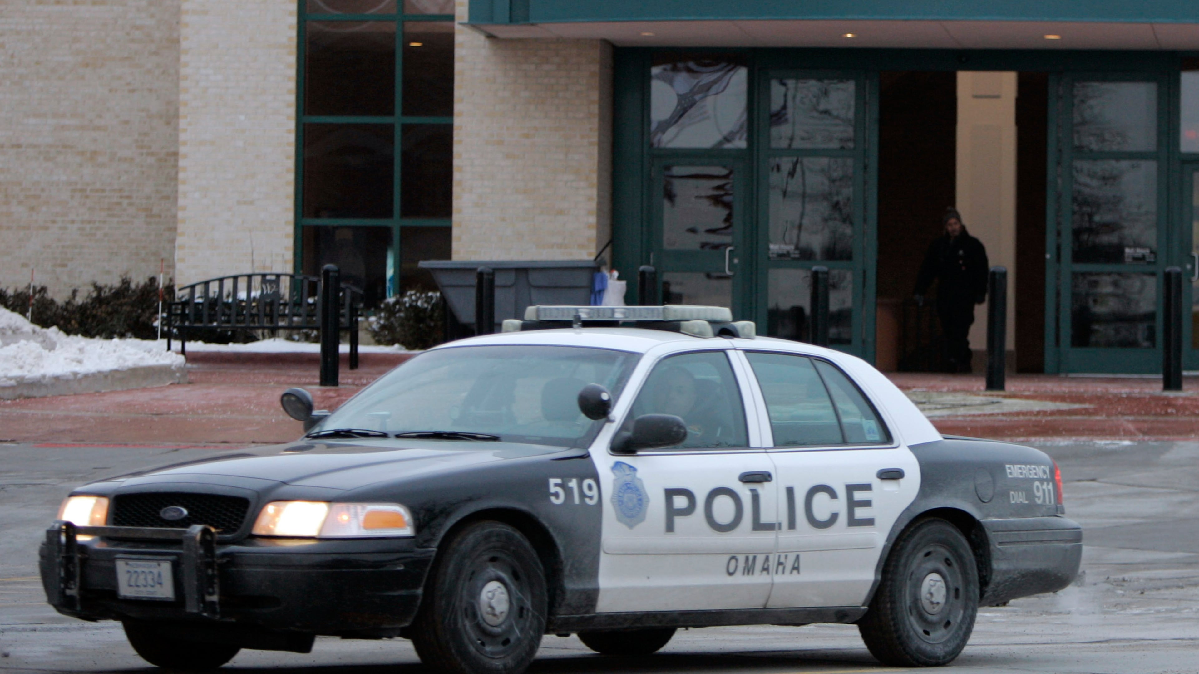 FILE - An Omaha police car drives on Dec. 8, 2007, in Omaha, Neb. (AP Photo/Jeff Roberson, File)
