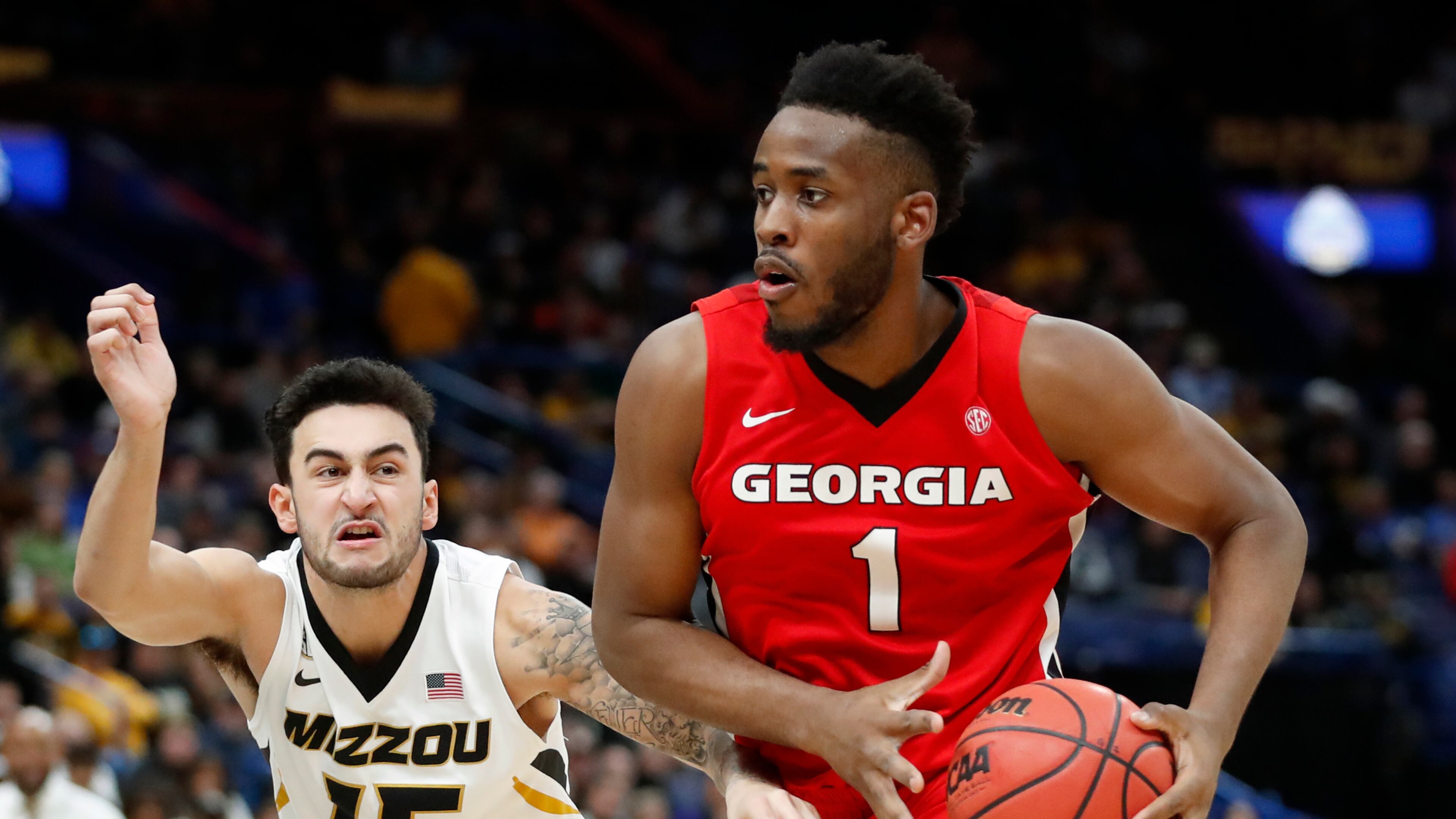 Georgia's Yante Maten (1) heads to the basket past Missouri's Jordan Geist (15) during the second half in an NCAA college basketball game at the Southeastern Conference tournament Thursday, March 8, 2018, in St. Louis. Georgia won 62-60. (AP Photo/Jeff Roberson)