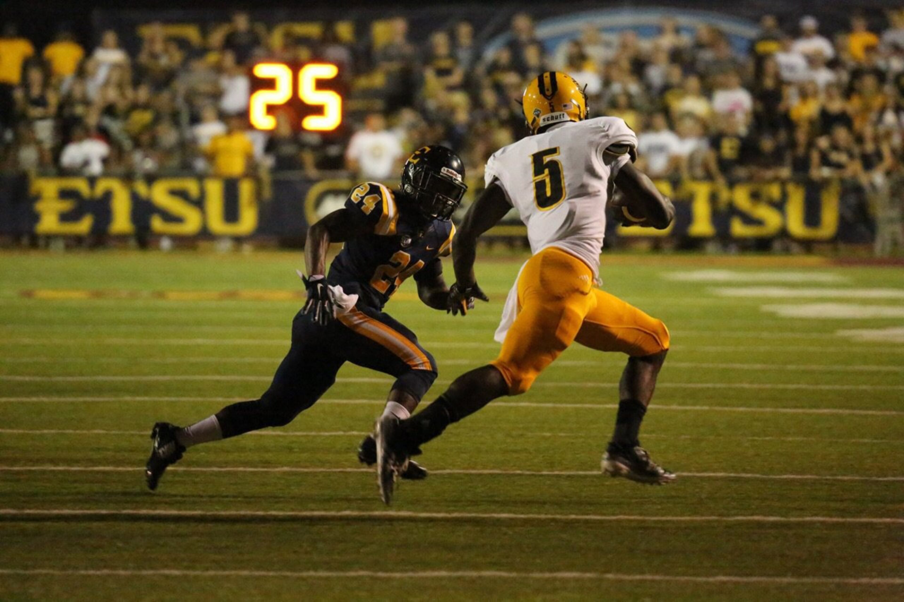 ETSU's Alonzo Francois chases down Kennesaw State's Prentice Stone.