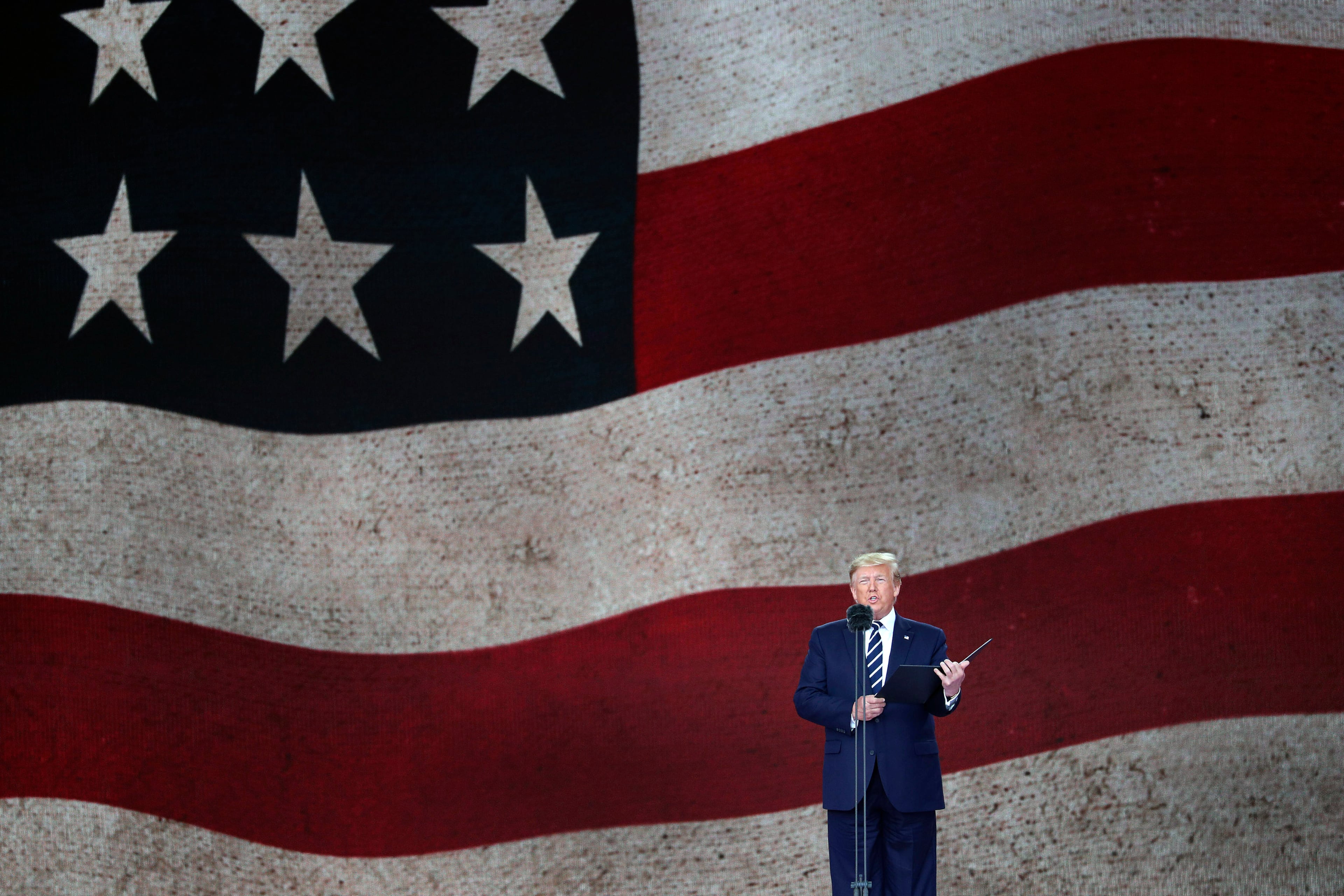 U.S. President Donald Trump speaks during commemorations for the 75th Anniversary of the D-Day landings in Portsmouth, England, Wednesday June 5, 2019. Commemoration events are marking the 75th Anniversary of the D-Day landings when Allied forces stormed the beaches of Normandy in northern France during World War II. (Andrew Matthews/PA via AP)