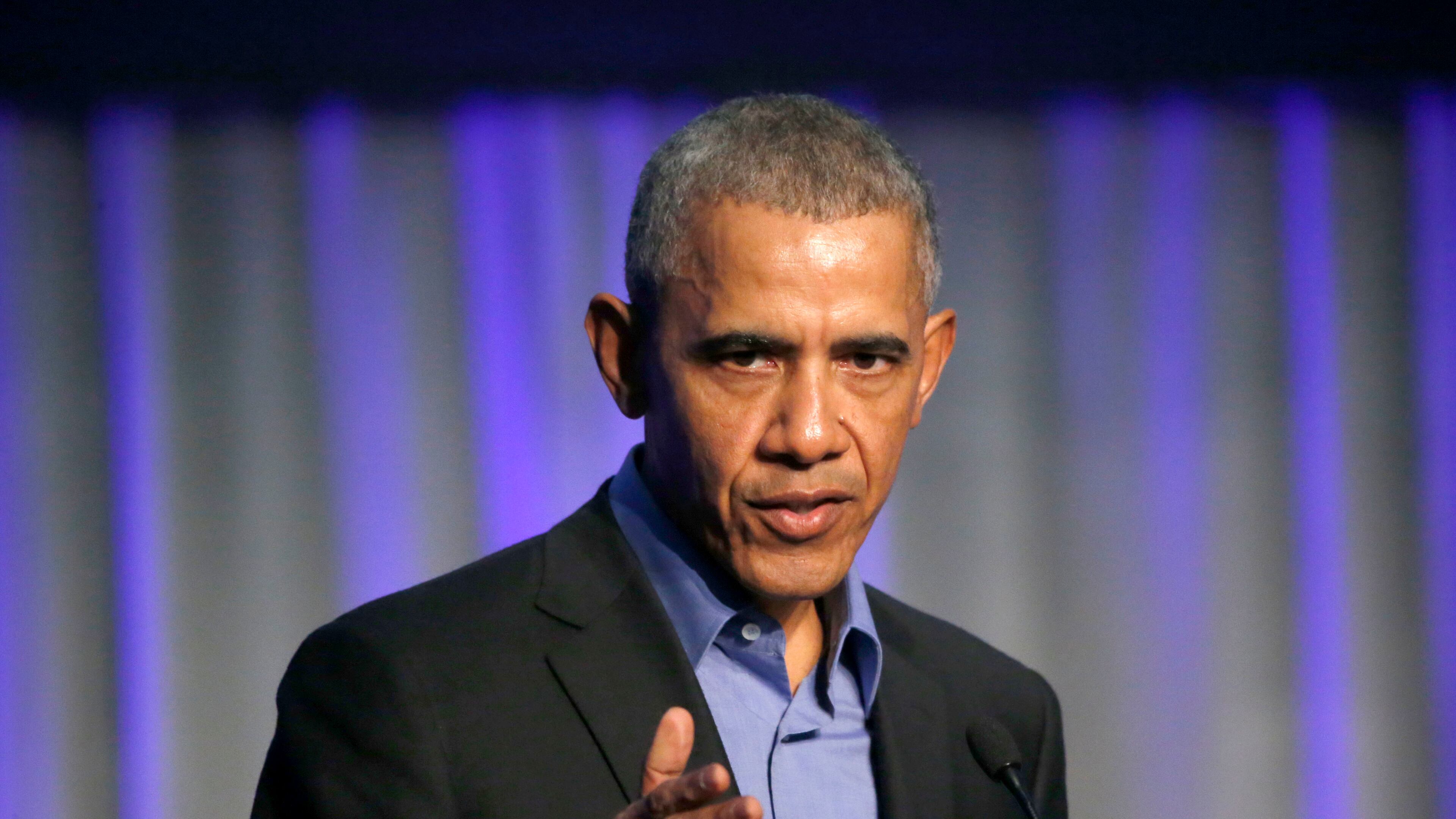 Former President Barack Obama addresses the participants at a summit on climate change involving mayors from around the globe Tuesday, Dec. 5, 2017, in Chicago. The conference comes after President Trump said the U.S. will pull out of the Paris agreement. (AP Photo/Charles Rex Arbogast)