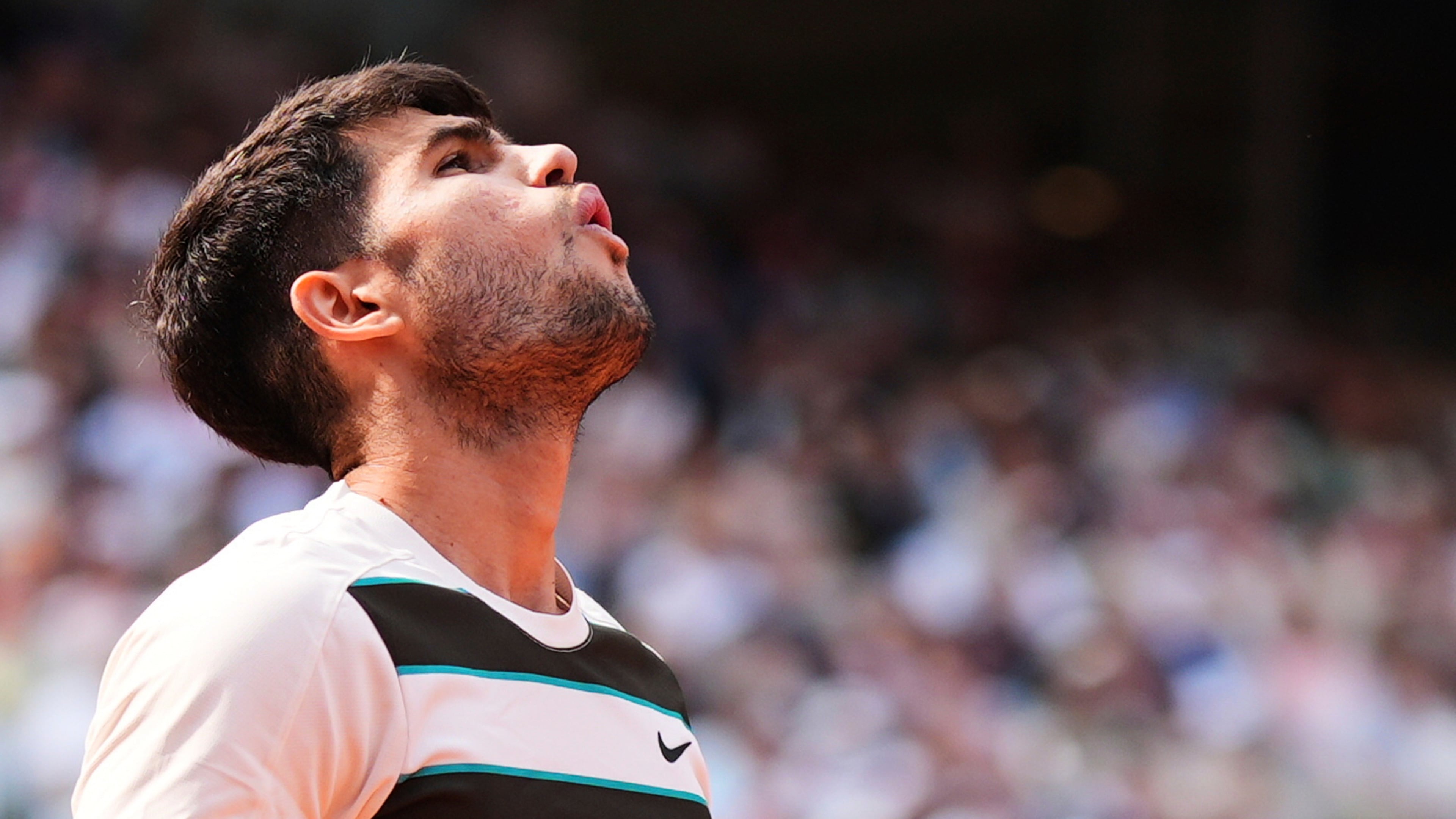 FILE - Spain's Carlos Alcaraz reacts during the final of the French Open tennis tournament against Italy's Jannik Sinner, Sunday, June 8, 2025, in Paris. (AP Photo/Lindsey Wasson, File)