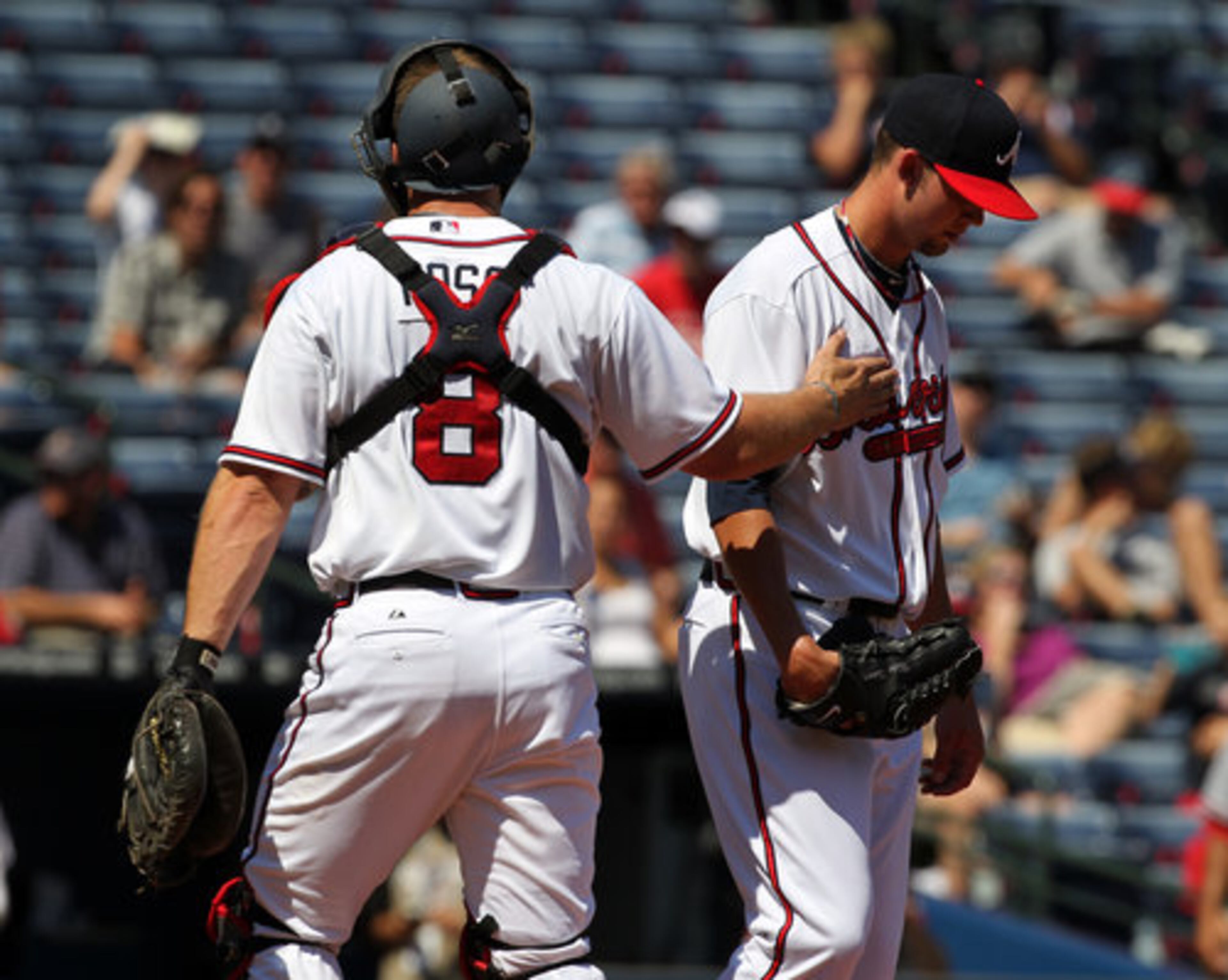 Atlanta Braves catcher David Ross encourages pitcher Mike Minor after he gives up a grand slam to Washington Nationals Justin Maxwell that gives the Nationals a early 4-0 lead during 2nd inning action at Turner Field in Atlanta on Wednesday, Sept. 15, 2010.