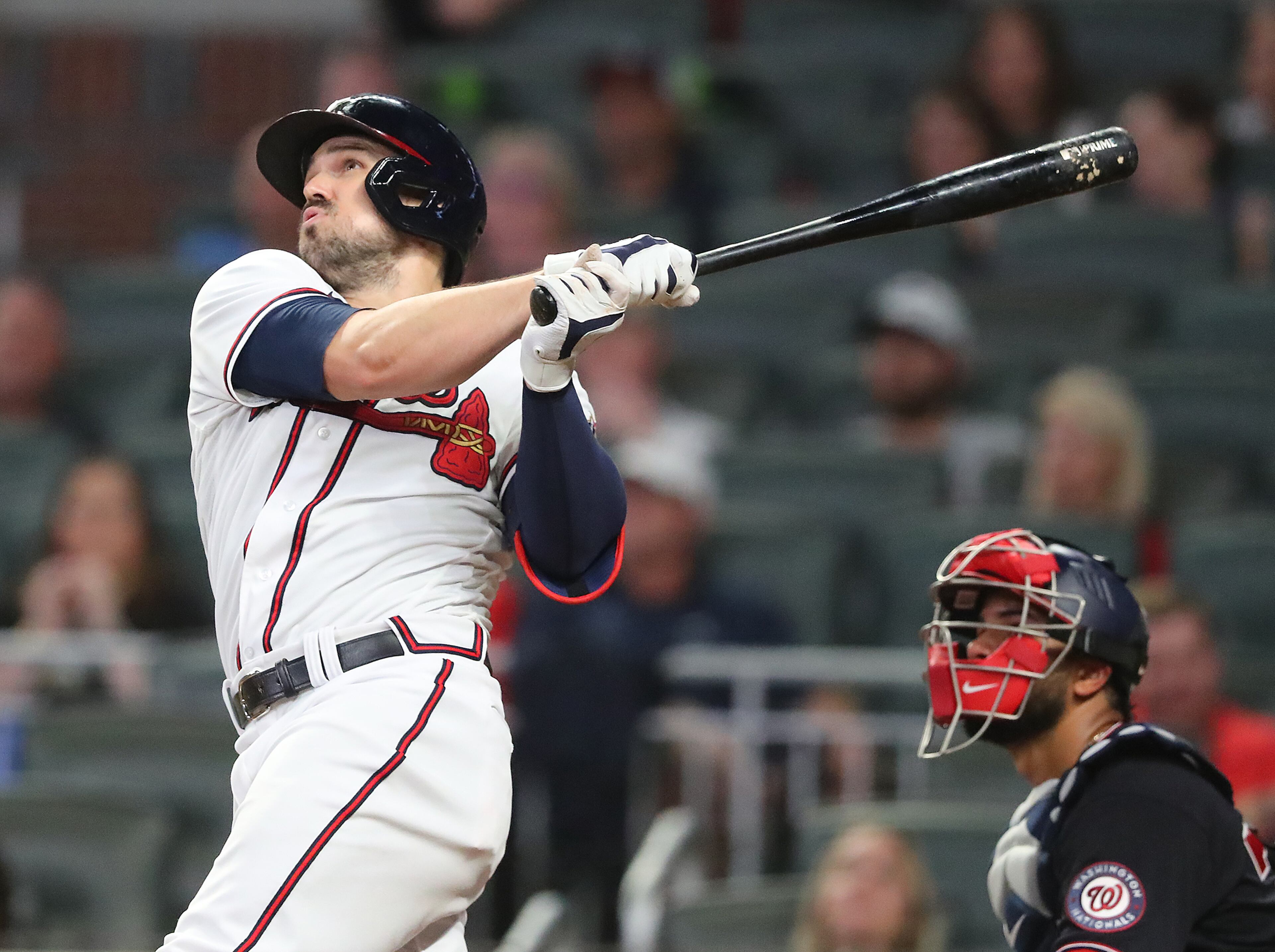Atlanta Braves outfielder Adam Duvall hits a solo home with Washington Nationals catcher Keibert Ruiz looking on during the fourth inning in a MLB baseball game on Wednesday, Sept 8, 2021, in Atlanta. “Curtis Compton / Curtis.Compton@ajc.com”