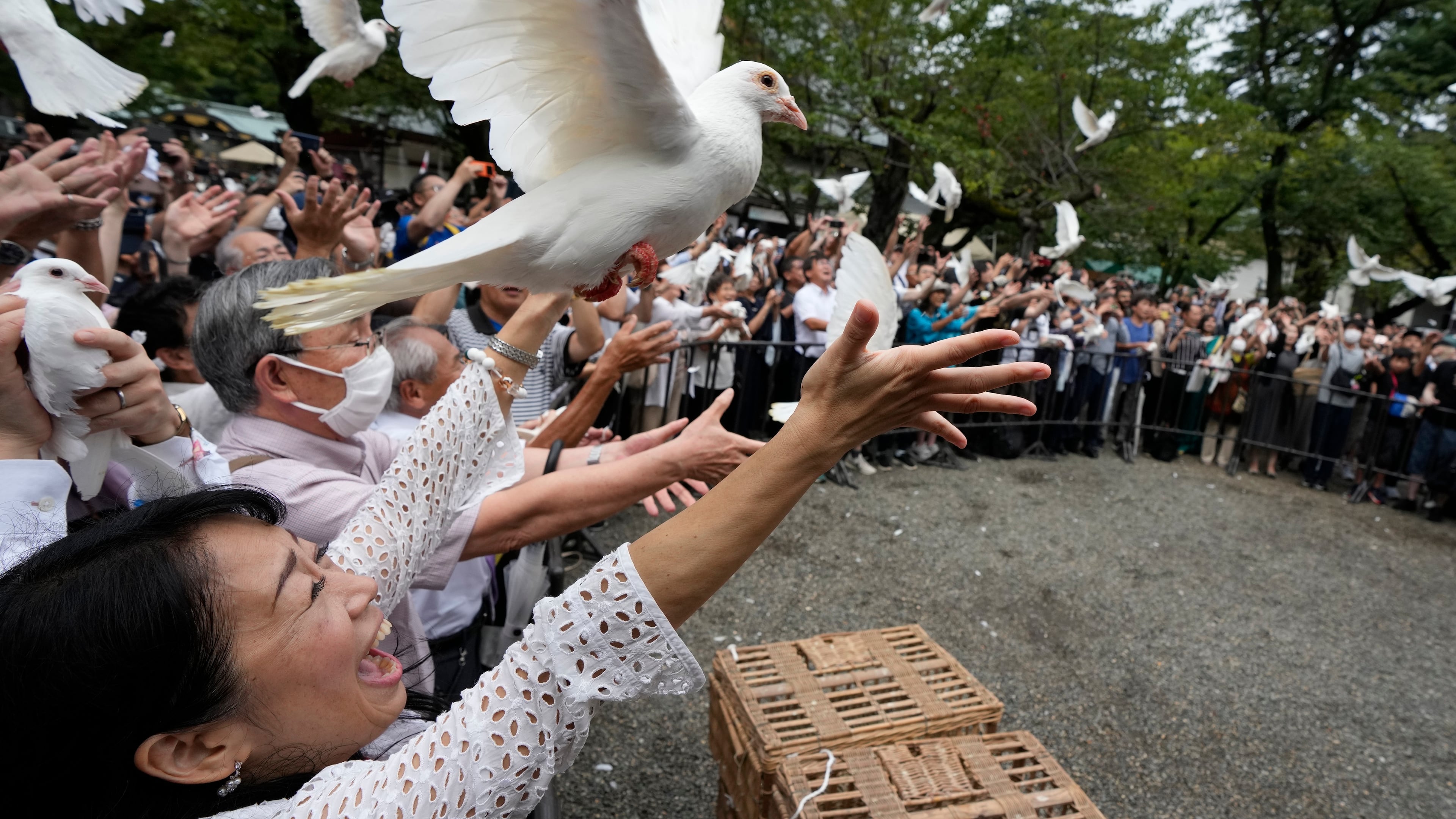FILE - Doves are released in prayer of peace by worshippers at the Yasukuni Shrine in Tokyo, Japan, Tuesday, Aug. 15, 2023. (AP Photo/Eugene Hoshiko, File)