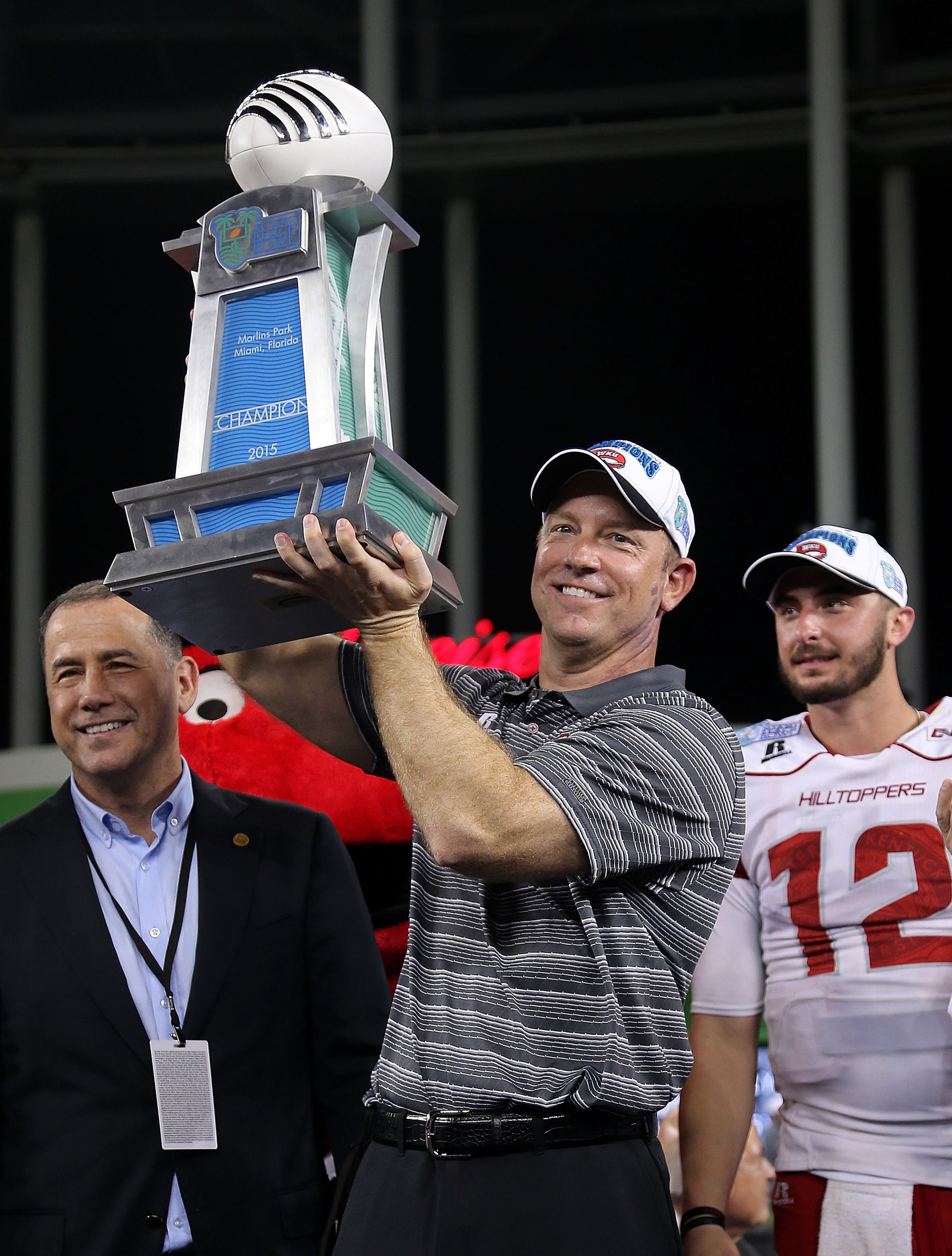 MIAMI, FL - DECEMBER 21: Head coach Jeff Brohm of the Western Kentucky Hilltoppers celebrates winning the 2015 Miami Beach Bowl against the South Florida Bulls at Marlins Park on December 21, 2015 in Miami, Florida. (Photo by Mike Ehrmann/Getty Images)