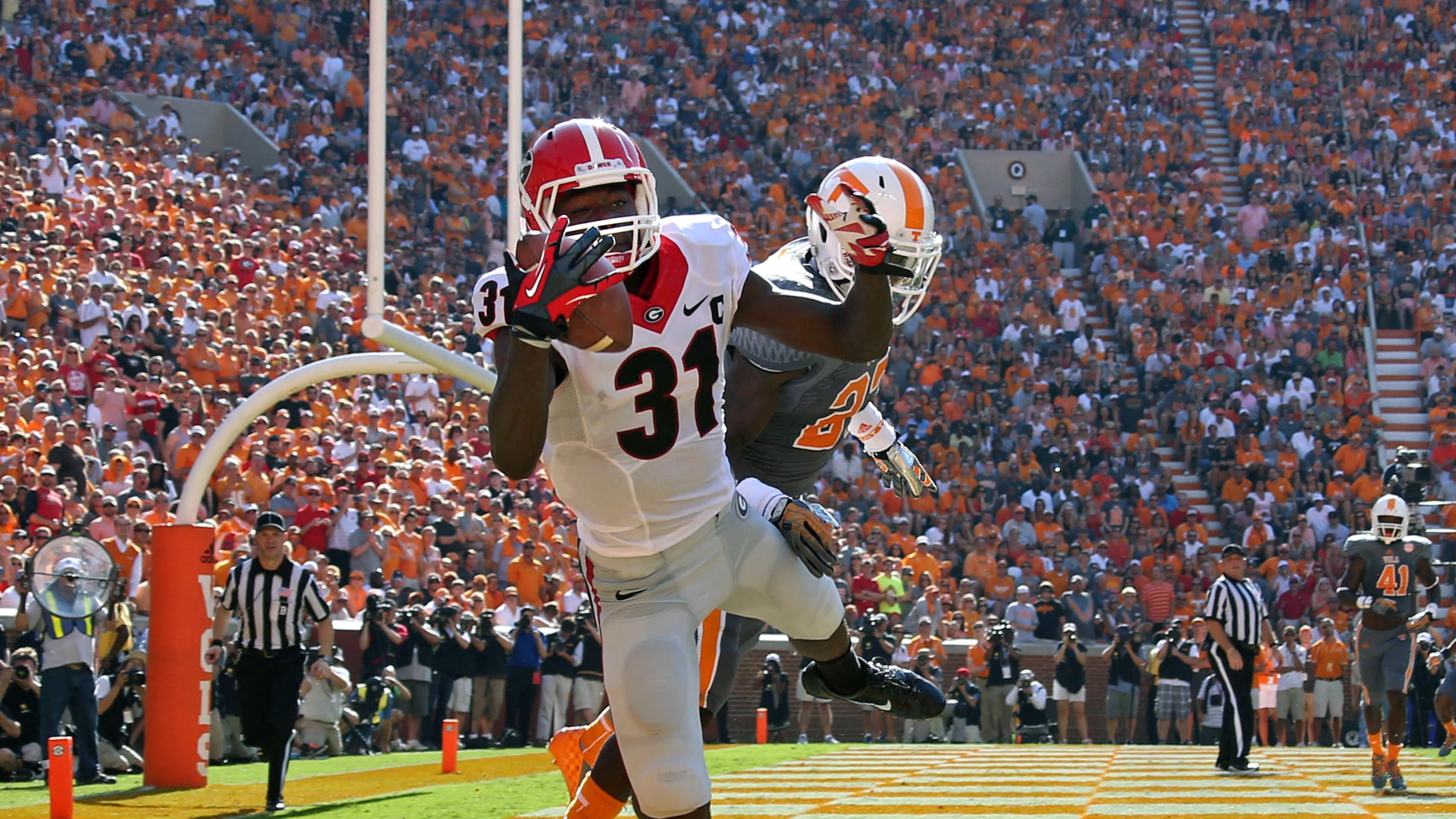 Former Bulldogs wide receiver Chris Conley is well aware of his team’s trials against its crimson nemesis, the struggle that goes back to his own days in red and black. (Jason Getz/AJC 2014)