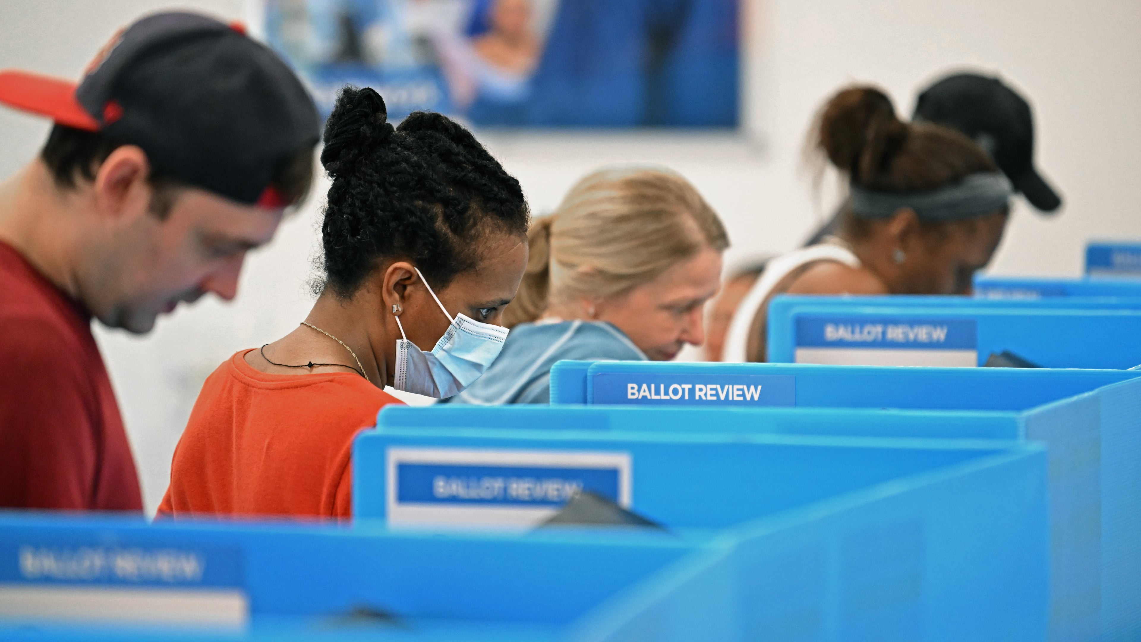 Voters cast their ballots during early in-person voting at the Gwinnett County Voter Registrations and Elections office in Lawrenceville on Wednesday, Oct. 30, 2024, in Lawrenceville. (Hyosub Shin/AJC)