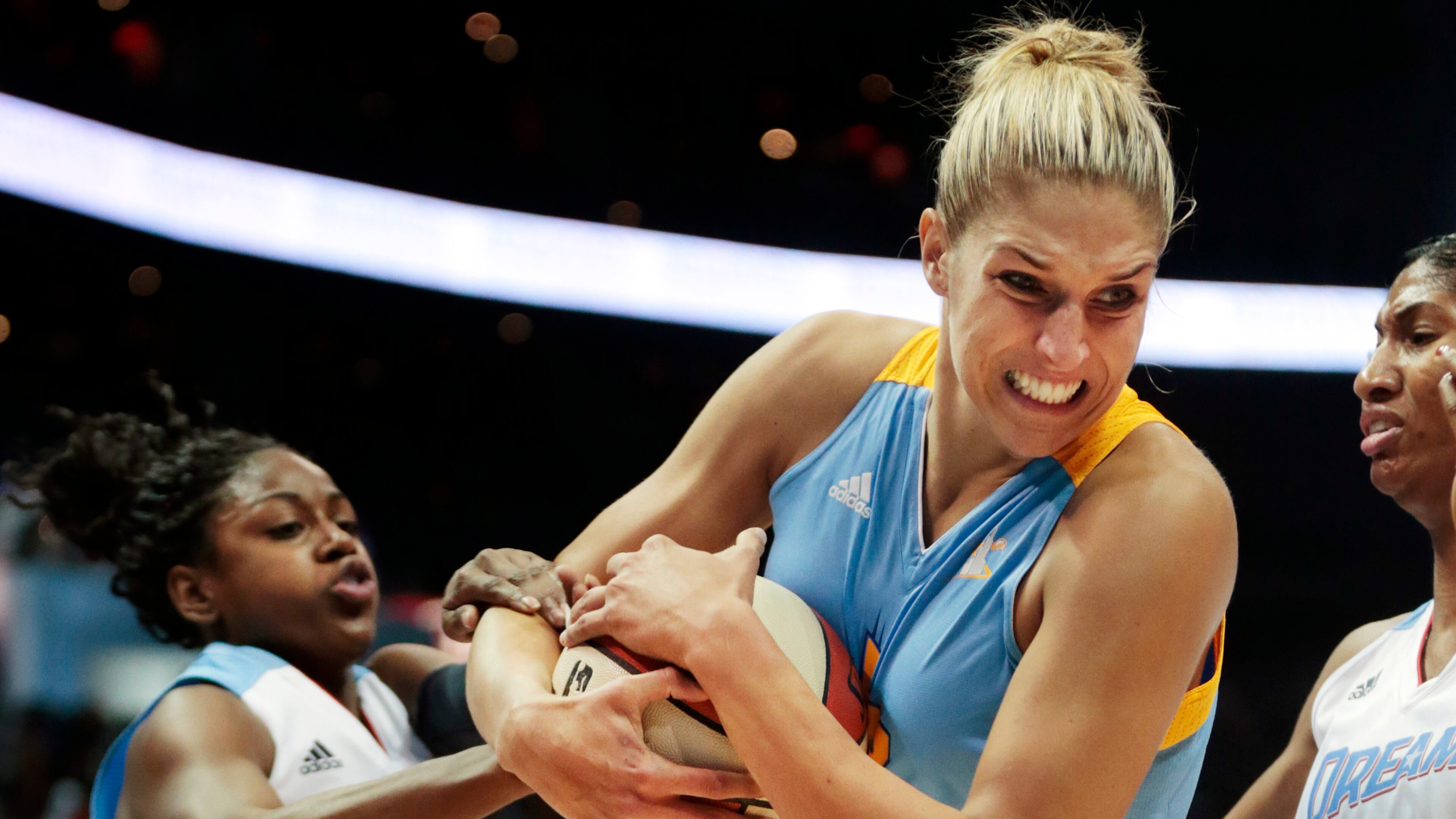 Chicago Sky's Elena Delle Donne, right, and Atlanta Dream's Tiffany Hayes, left, tussle for the ball during the first half of Game 1 of the WNBA basketball Eastern Conference semifinals, Friday, Aug. 22, 2014, in Atlanta. (AP Photo/John Bazemore)
