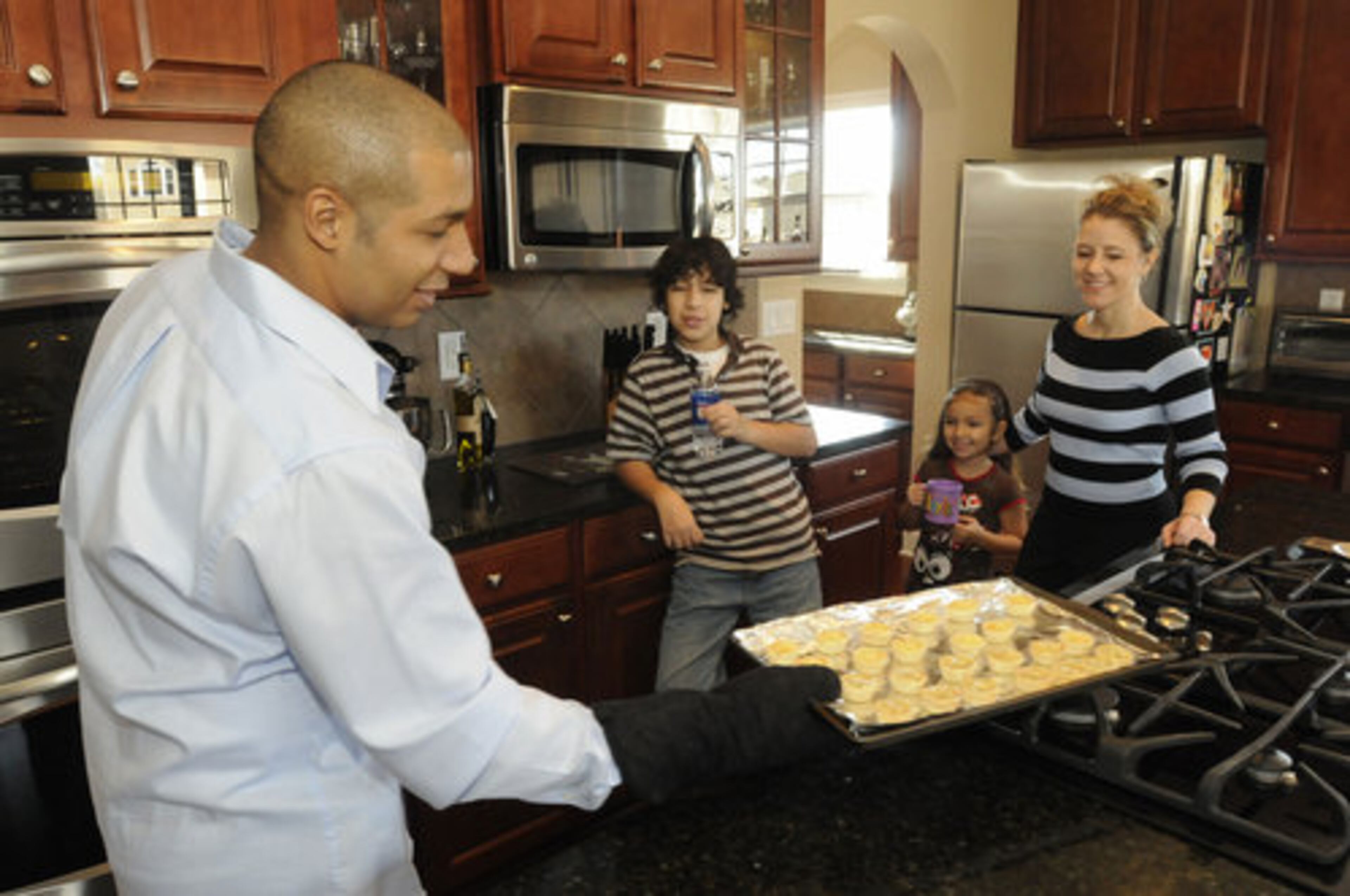 The kitchen was a huge draw for the Faraca family. There's a large dining room with a double leaf in (the table) that seats 10 people. There's also a butler's pantry right off from the kitchen and a huge island that can seat four people on one side, and a breakfast area off that which has a table that can seat eight.