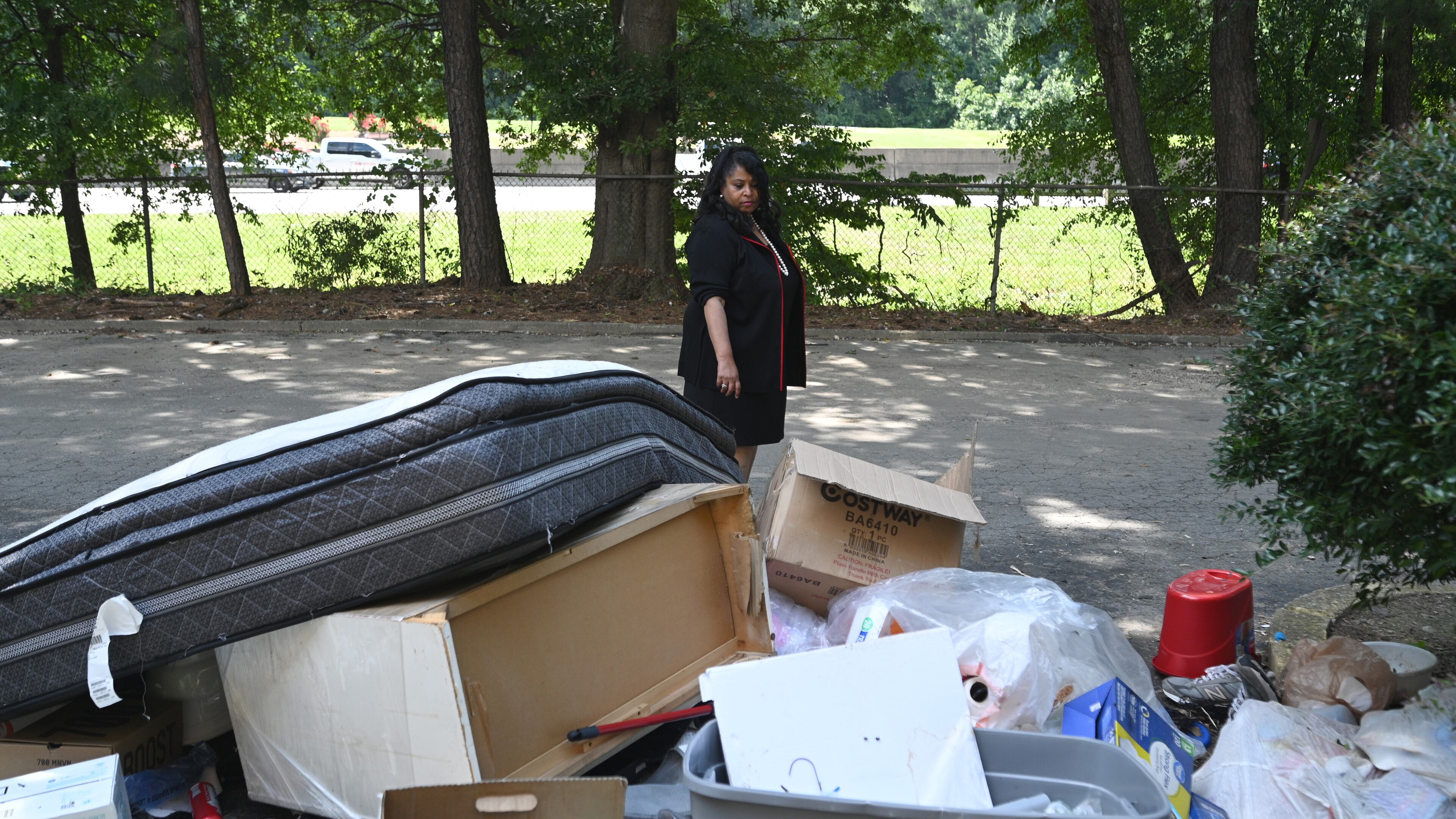 Atlanta City Councilwoman Andrea Boone, who introduced the resolution urging crackdown of negligent landlords, checks conditions of one of negligent apartment complexes at Vue at Harwell in Atlanta on Friday, July 15, 2022. The Atlanta City Council formally urged law enforcement officials to pursue charges against negligent apartment landlords, in response to an Atlanta Journal-Constitution investigation into the issue. (Hyosub Shin / Hyosub.Shin@ajc.com)