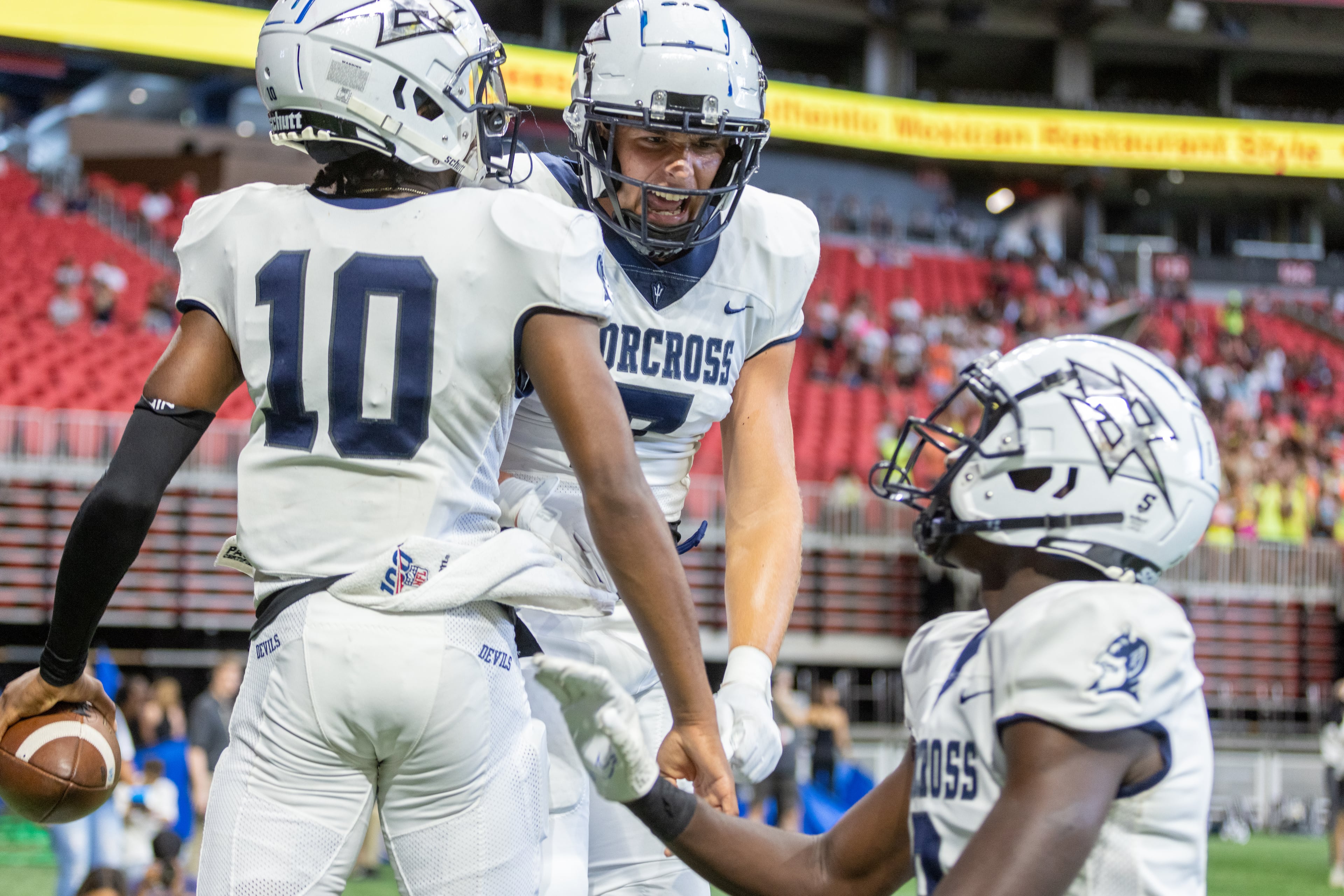 Norcross High School player celebrates after scoring a touchdown during their game with Brookwood High School during the Corky Kell Classic at the Mercedes Bens Stadium Saturday, August 20, 2022. Steve Schaefer/steve.schaefer@ajc.com)