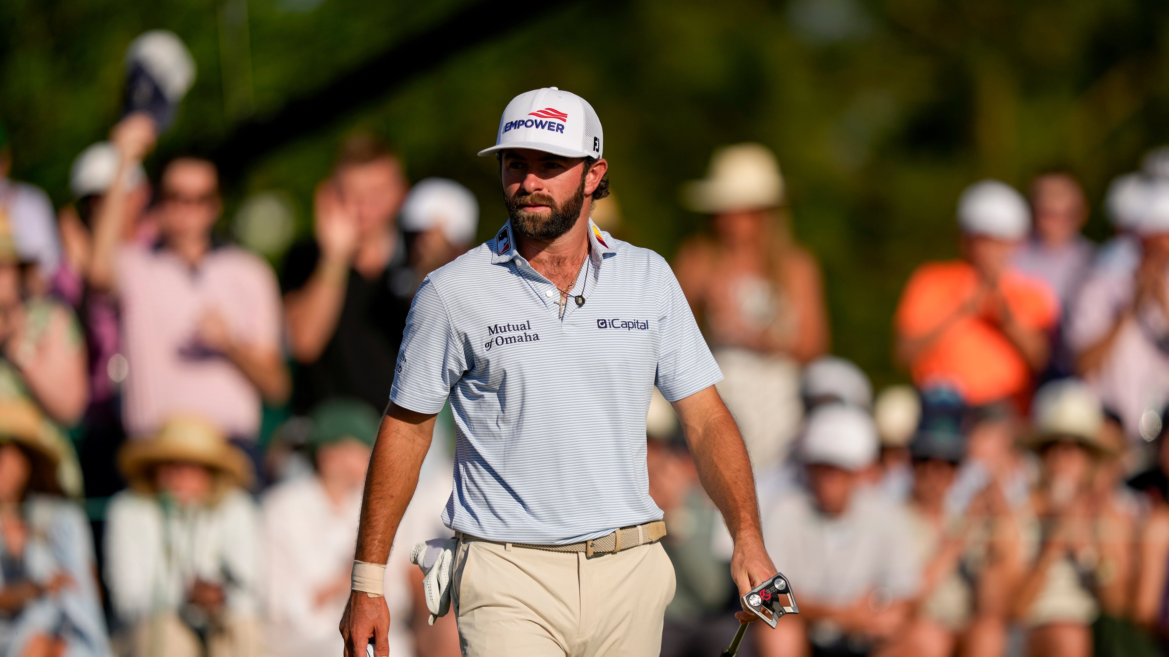 Cameron Young walks off the green after his third round at the Masters golf tournament at the Augusta National Golf Club, Saturday, April 11, 2026, in Augusta, Ga. (AP Photo/Matt Slocum)