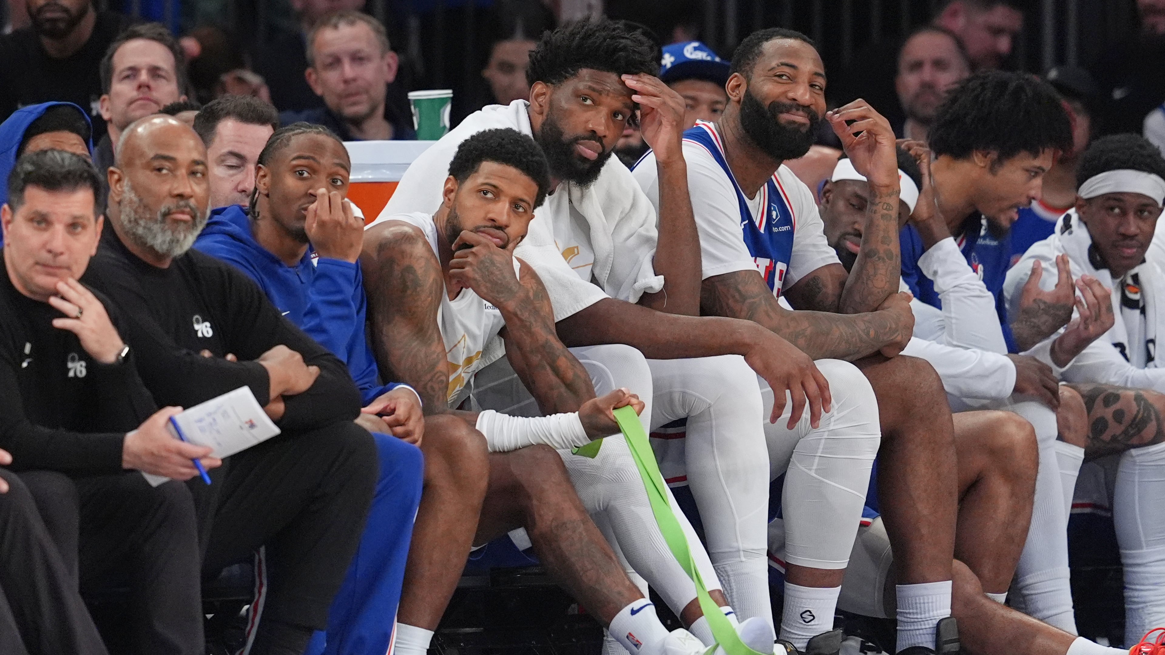 Most of the starting line-up for the Philadelphia 76ers watches from the bench during the second half of Game 1 in a second-round NBA basketball playoffs series against the New York Knicks Monday, May 4, 2026, in New York. (AP Photo/Seth Wenig)