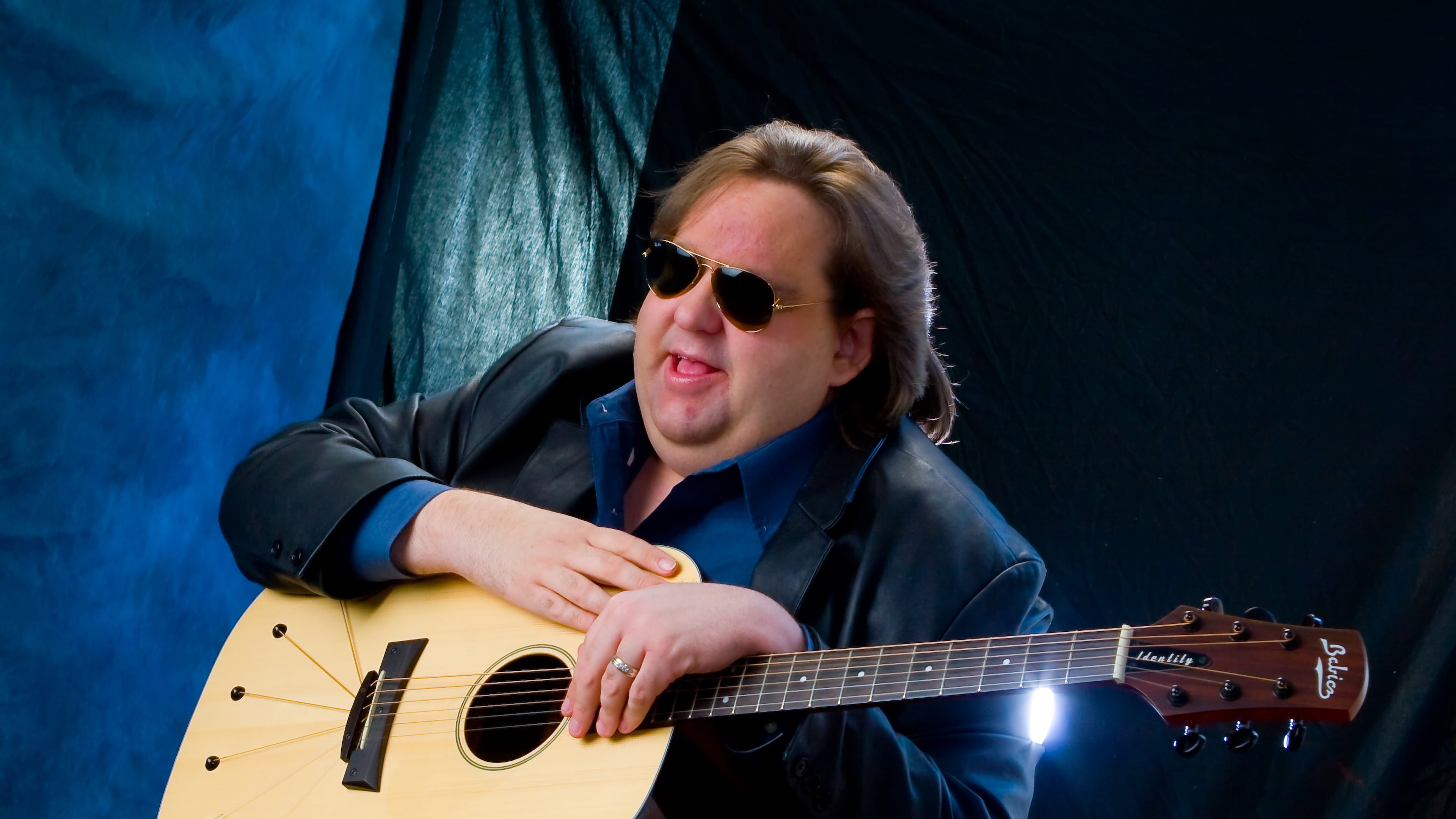 Joey Stuckey returned to playing live music after the pandemic and toured Europe and the U.S. earlier this year, playing a variety of venues from small bars to festivals with crowds of 10,000. Photo courtesy of Joey Stuckey.