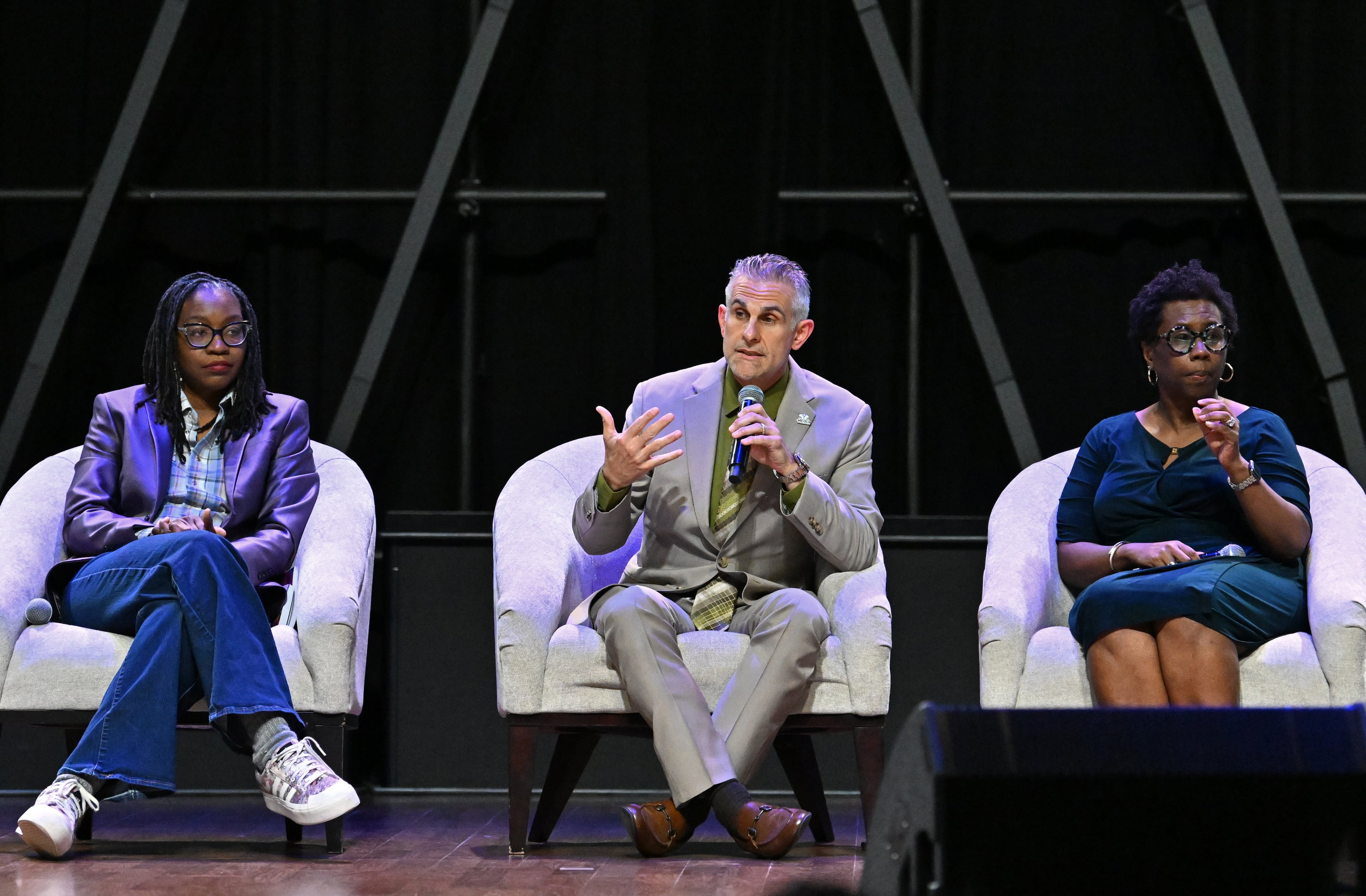 DeKalb County interim Superintendent Norman C. Sauce III (center) speaks during a panel discussion with other school administrators at a community meeting on possible DeKalb school closures at New Life Church on Tuesday, April 28, 2026, in Decatur. (Hyosub Shin/AJC)