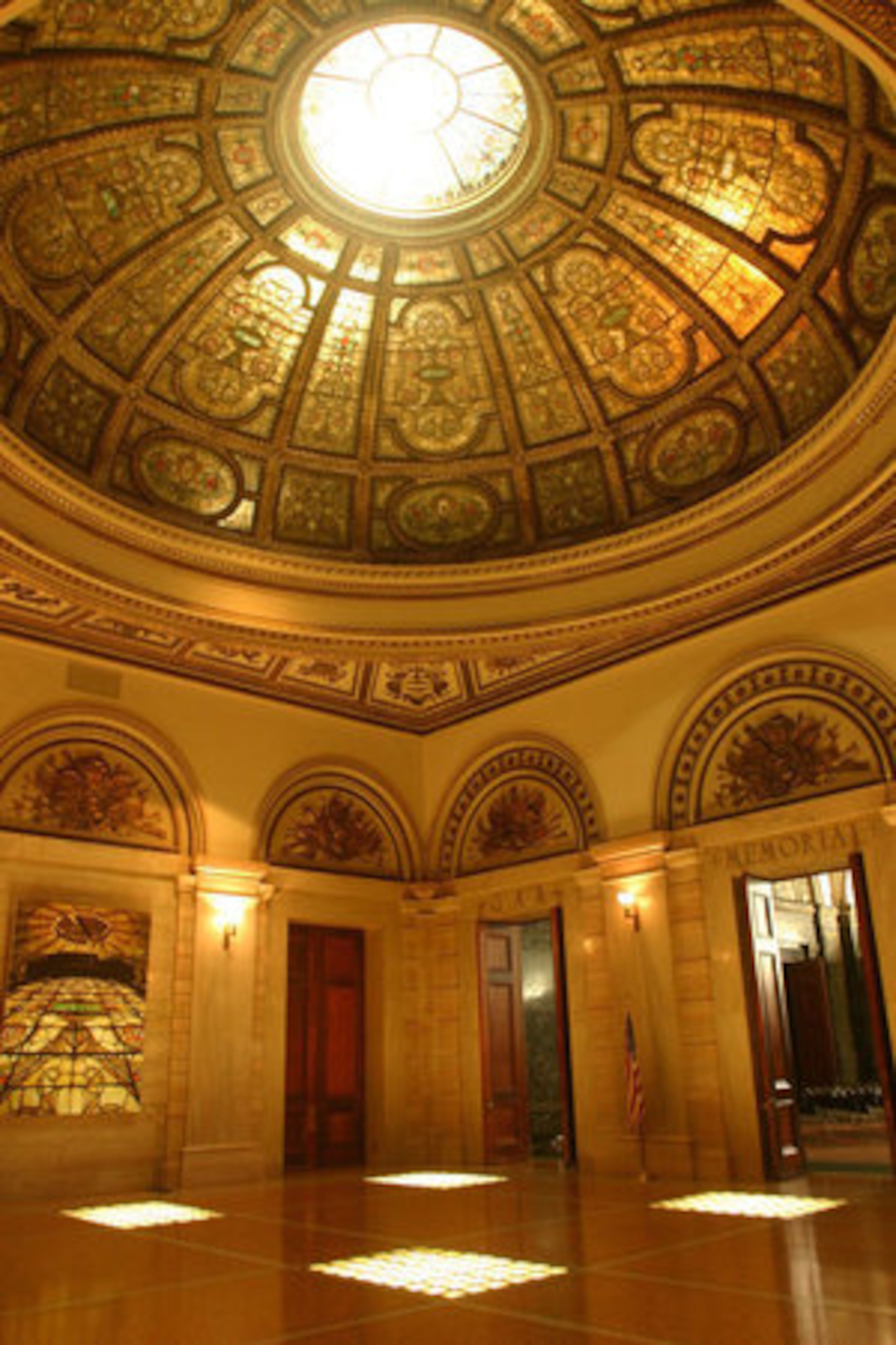 The lavish interior of the Chicago Cultural Center includes a Haly and Millet stained glass dome.