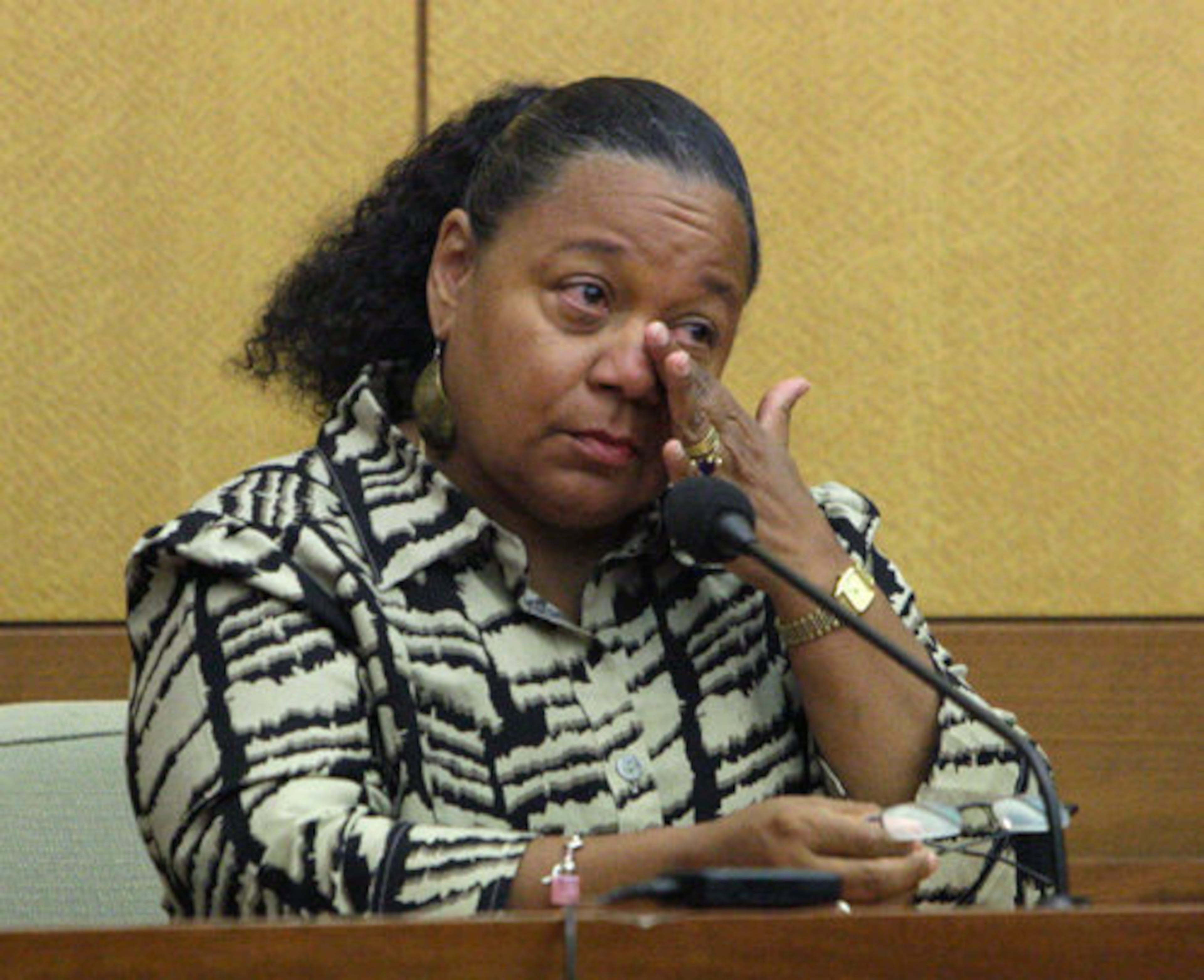 Witness Marion Beckett became tearful when she talked about a child being killed during the second day of trial of Aimee Michael, accused of killing five people in a hit-and-run wreck on Easter Sunday 2009.