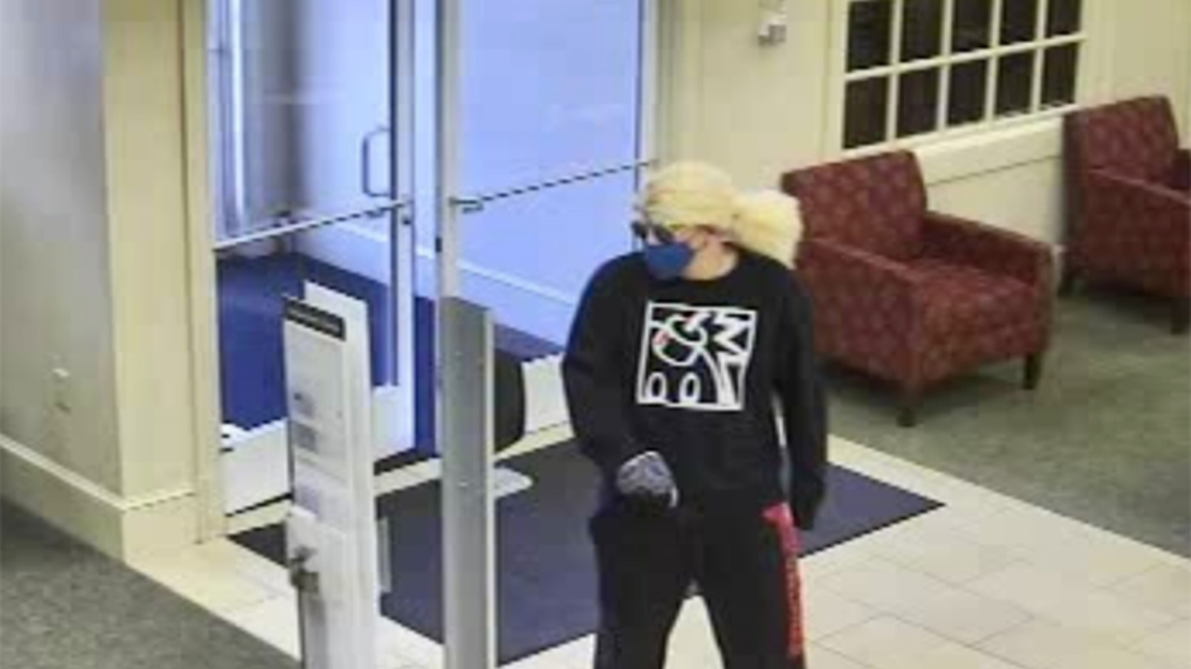 A man wearing a blond wig, dark sunglasses and a bandana over his face robbed a Wells Fargo bank in Macon on Monday, according to authorities.