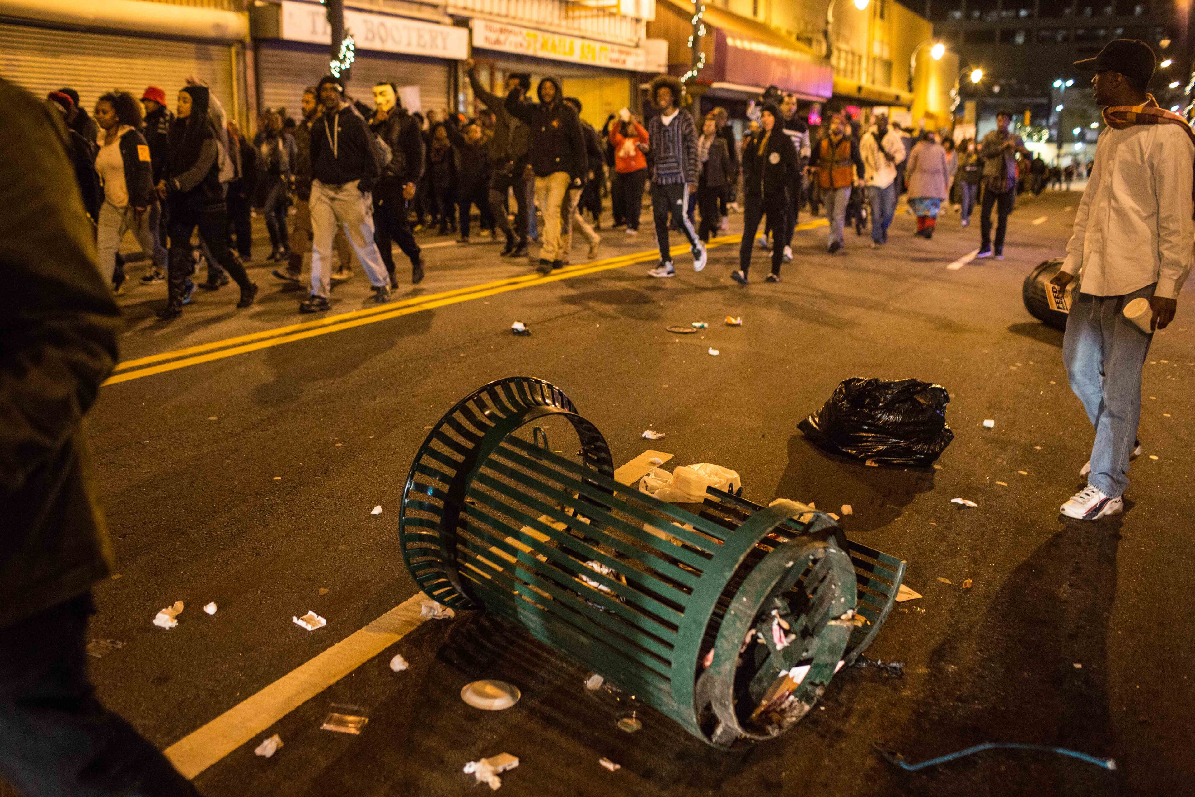 Protesters march the streets in Atlanta a day after following the decision from a Missouri grand jury to not indict Ferguson, Missouri, officer Darren Wilson in the shooting death of an unarmed teen. (SPECIAL/BRANDEN CAMP)