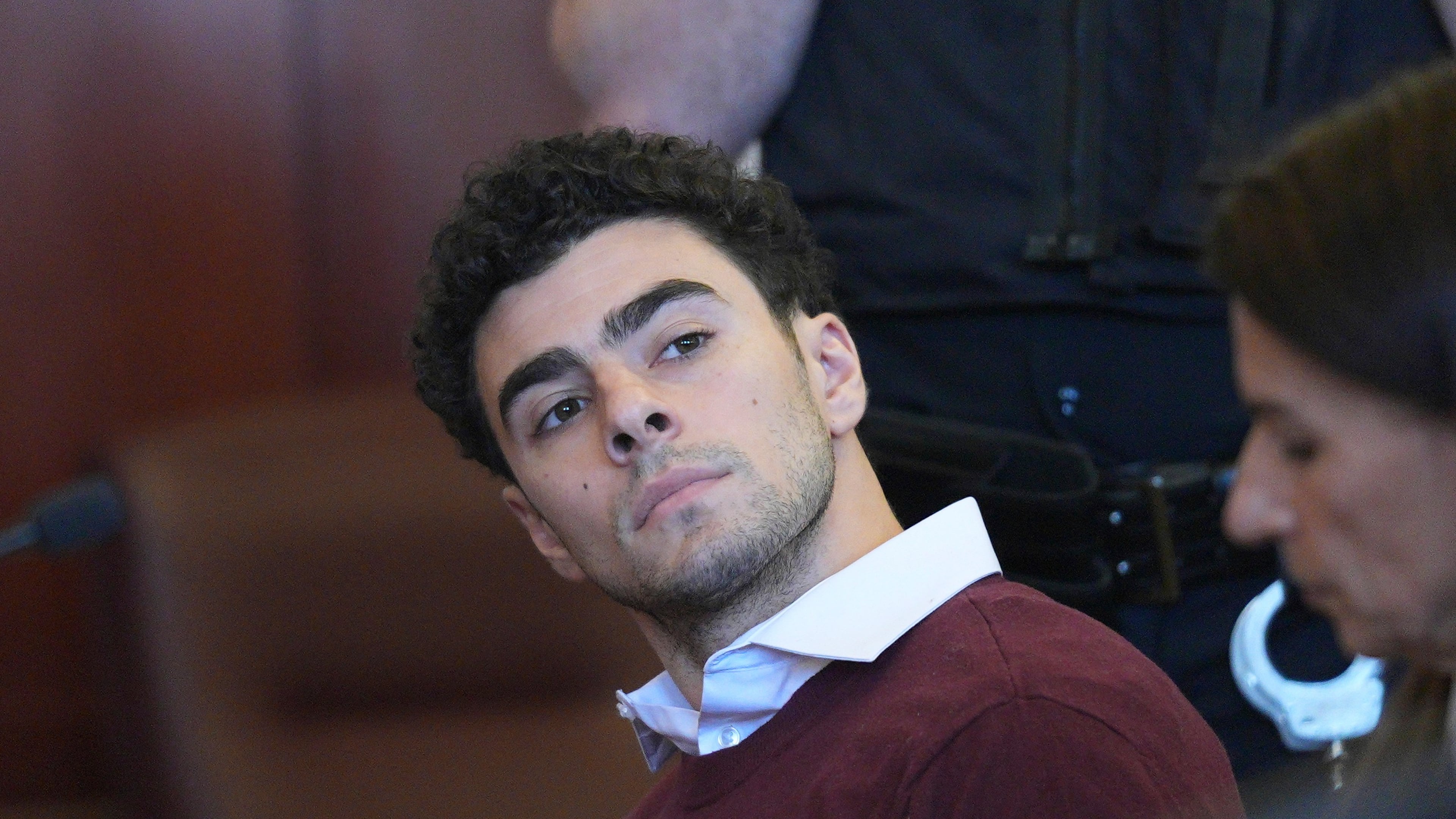 FILE - Luigi Mangione appears in Manhattan Criminal court, Dec. 23, 2024, in New York. (Curtis Means/Pool Photo via AP, file)