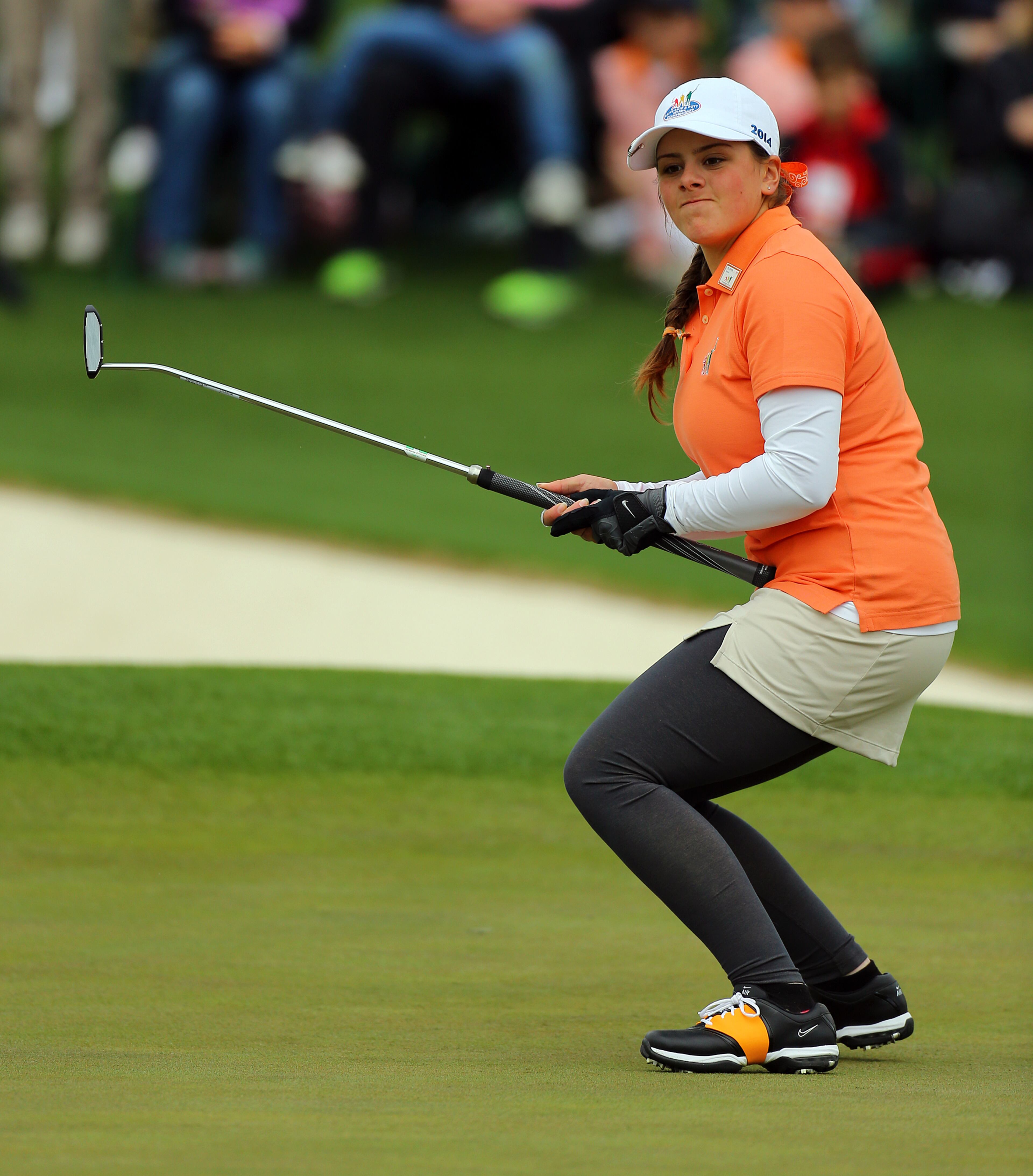 Riley Rennell, Columbia, TN, reacts to just missing her putt on the 18th green in the first ever Drive, Pitch, and Putt National Finals at Augusta National Golf Club before the Masters on Sunday, April 6, 2014, in Augusta. There are 88 National Finalists, 44 boys and 44 girls participating from 27 states, the District of Columbia and Canada. CURTIS COMPTON / CCOMPTON@AJC.COM