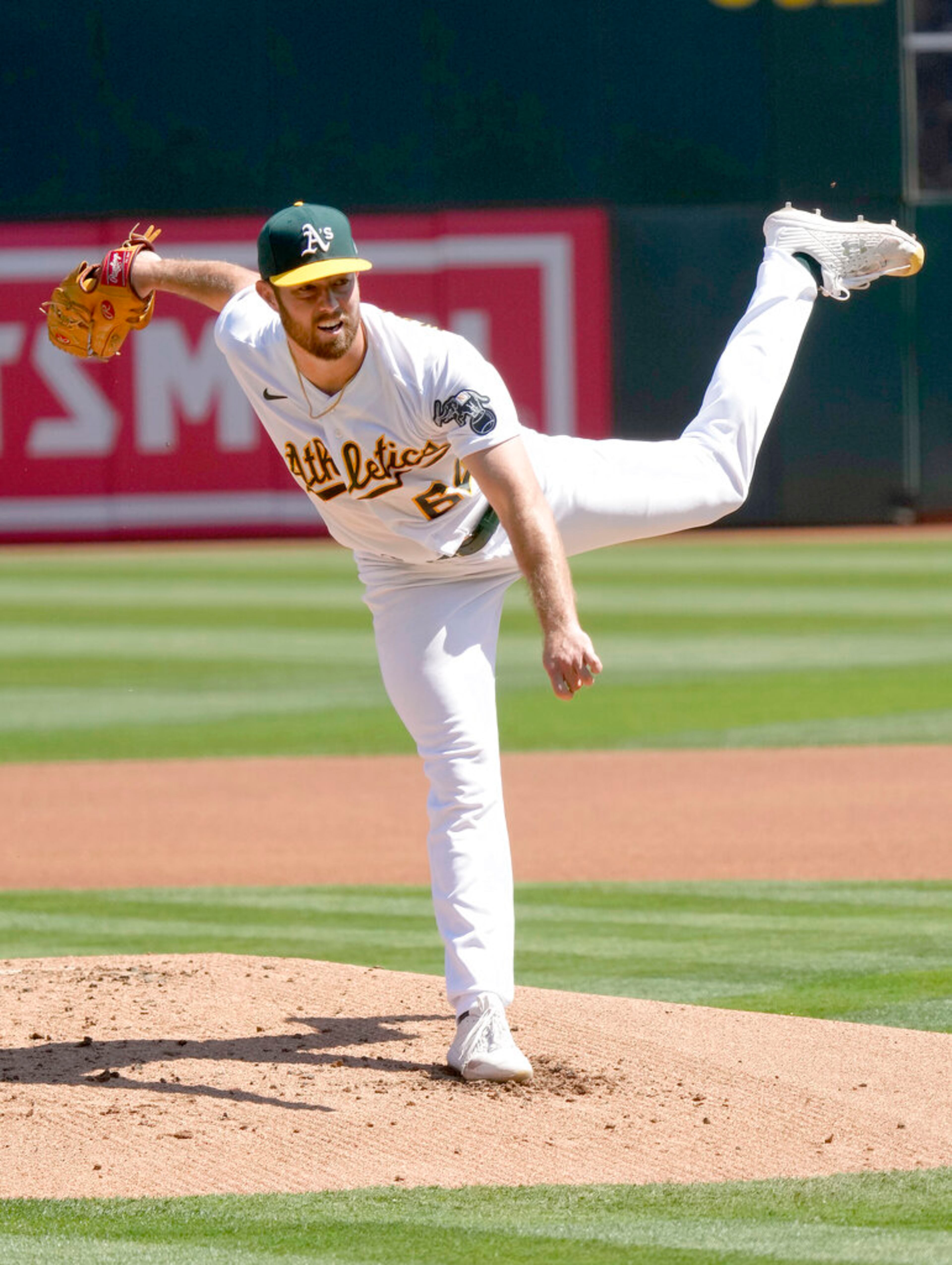 Oakland Athletics starting pitcher Ken Waldichuk throws against the Atlanta Braves during the first inning of a baseball game in Oakland, Calif., Wednesday, Sept. 7, 2022. (AP Photo/Tony Avelar)
