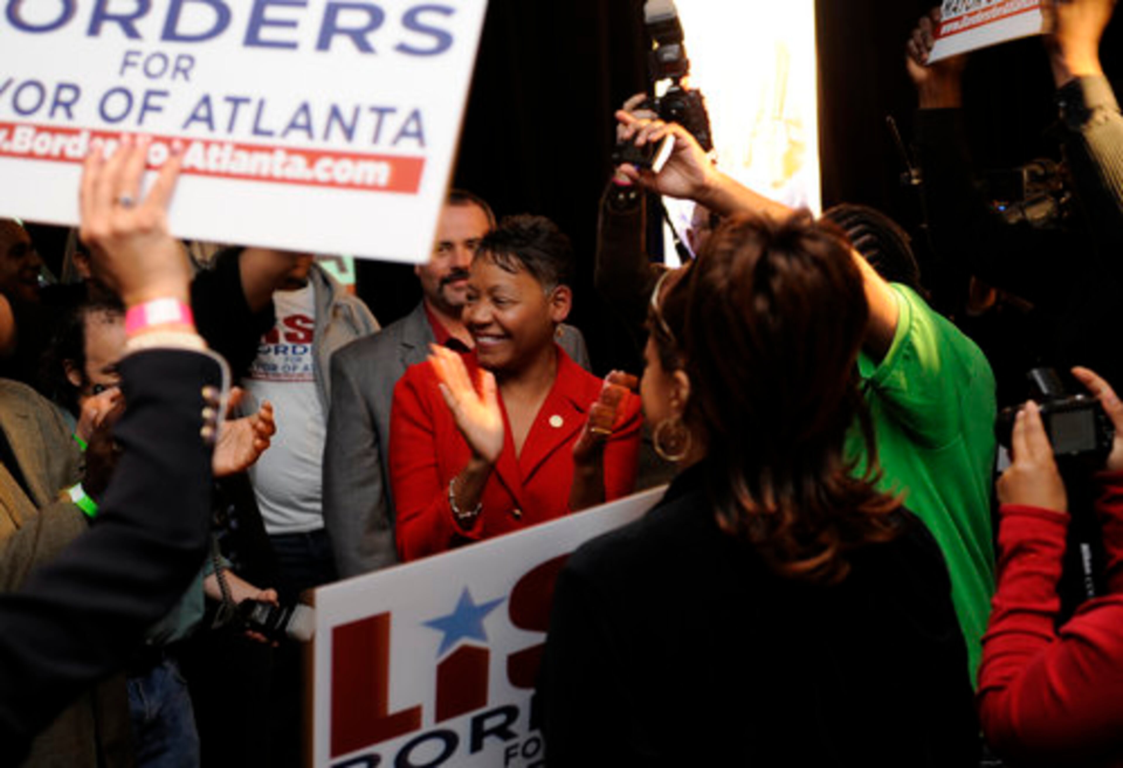 Lisa Borders greets her supporters at her election party
