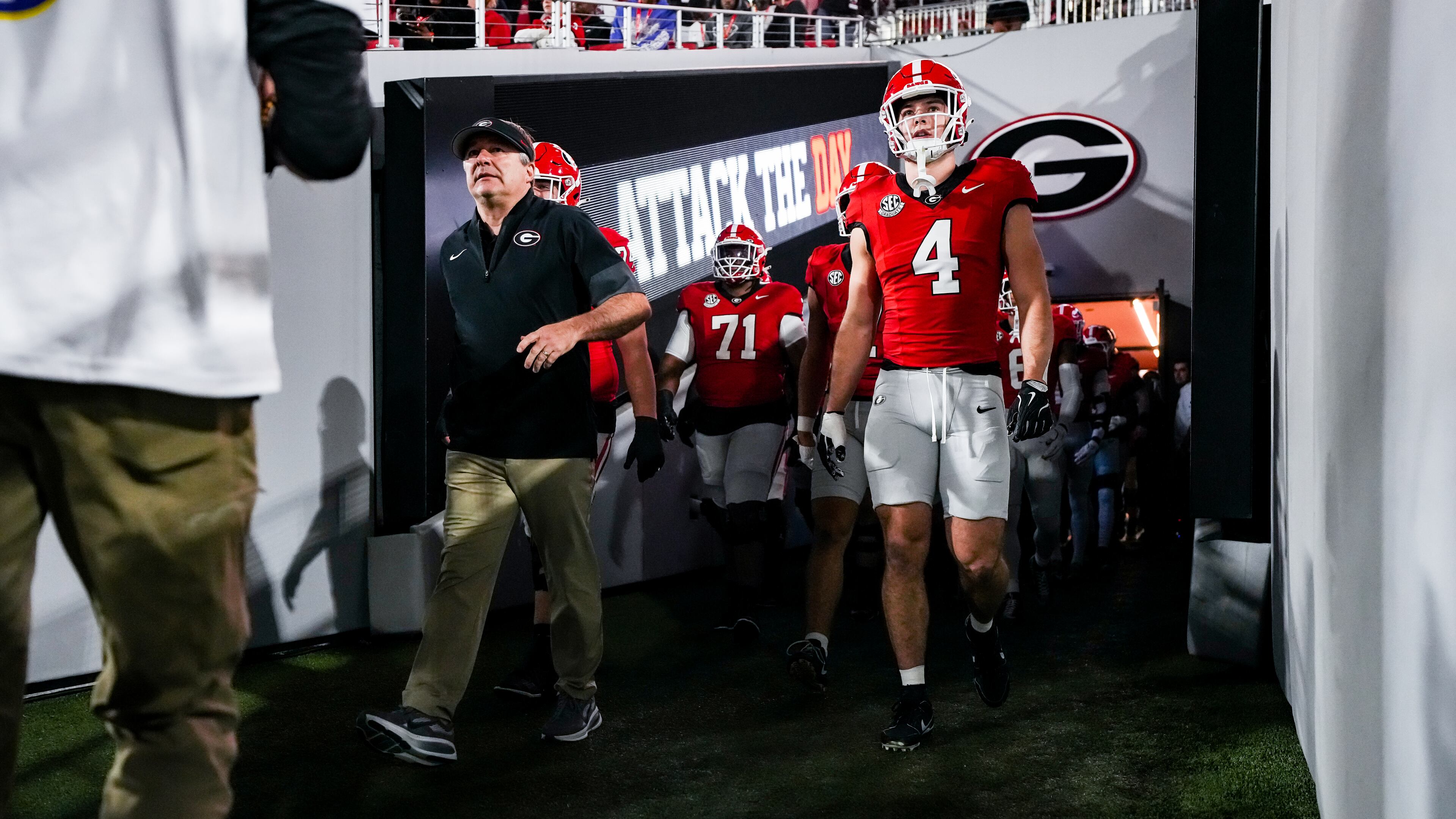 Georgia tight end Oscar Delp, leaving the tunnel with coach Kirby Smart, played his final regular-season home game at Sanford Stadium on Saturday. (Tony Walsh/UGAAA)