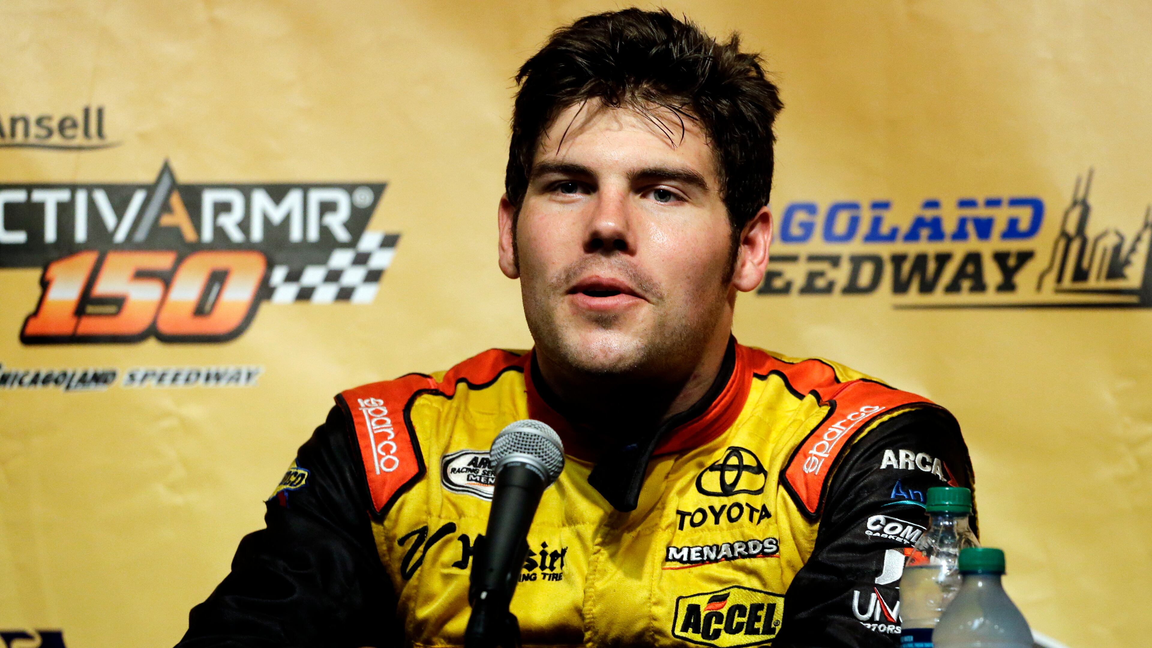 John Wes Townley, shown during a 2014 news conference, was killed Saturday in a shooting in Athens that also injured his ex-wife. According to police, Townley attacked the gunman with a hatchet before he opened fire.