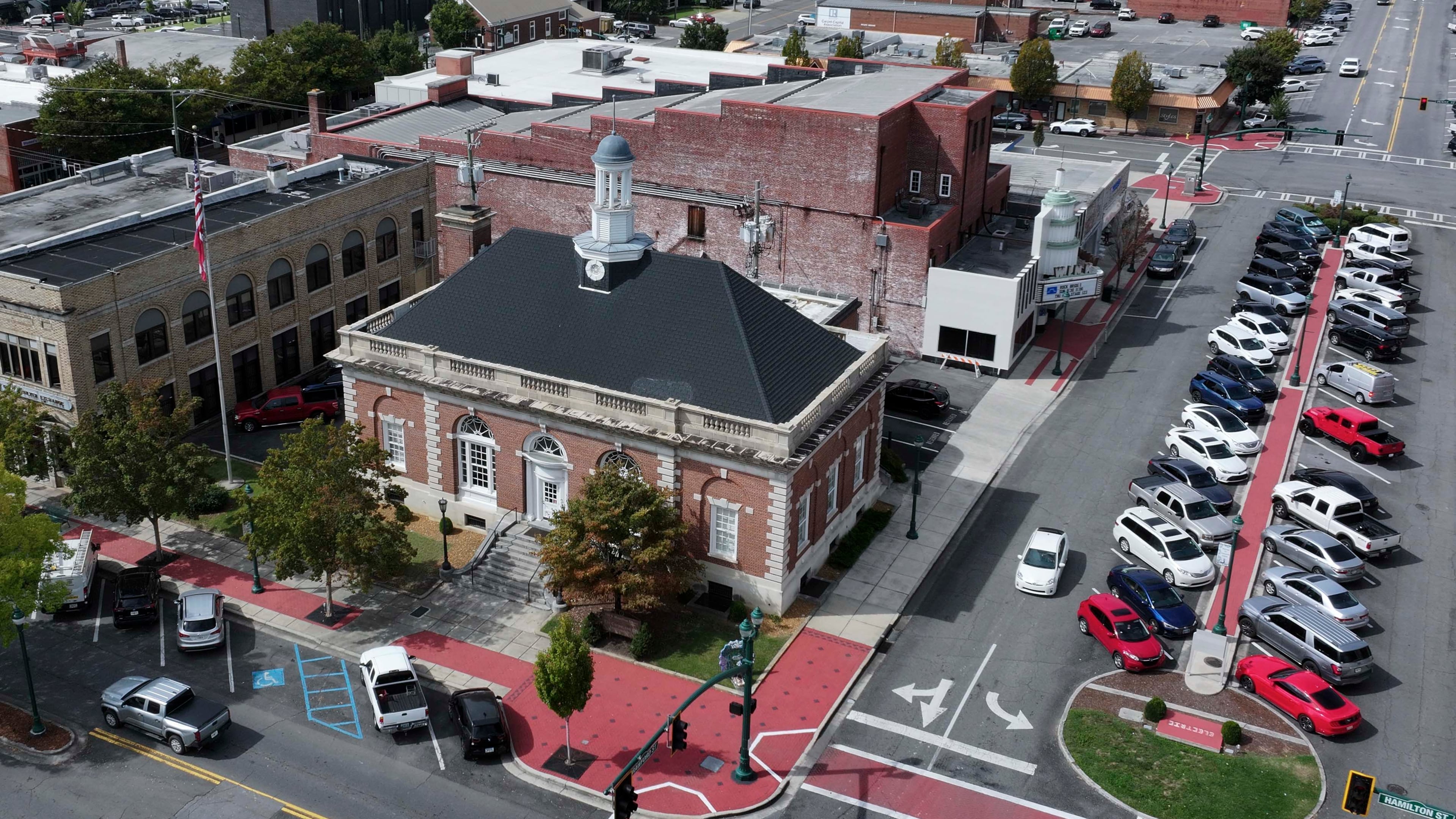 This 2025 aerial image shows the location of the Carpet and Rug Institute building in downtown Dalton. (Miguel Martinez/AJC)