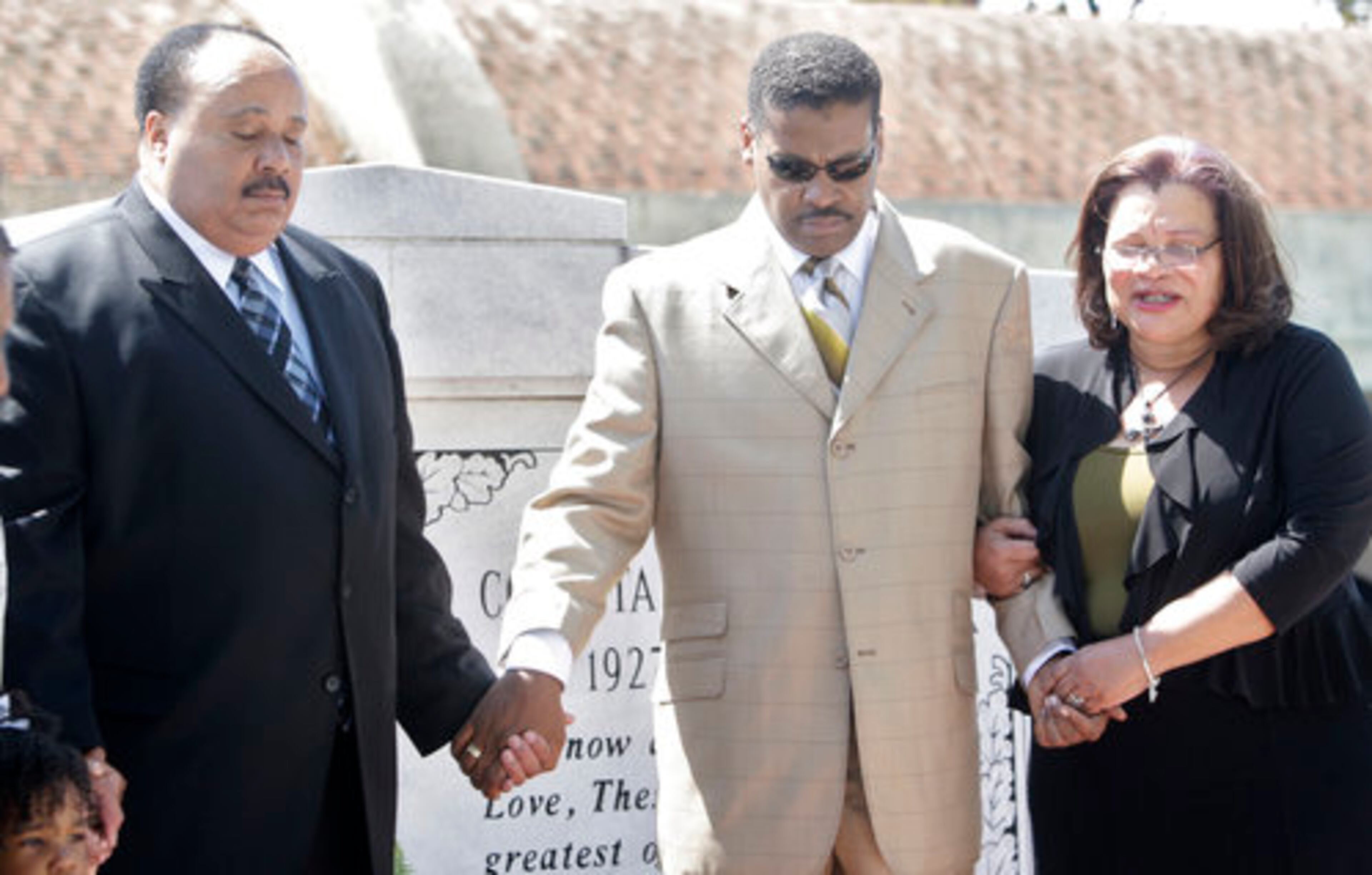 Martin Luther King, III, Isaac Newton Farris, Jr. and Alveda King joined other family members in prayer after laying a wreath at the tomb of Martin Luther King, Jr. on the 43rd anniversary of his assassination on Monday, April 4, 2011.