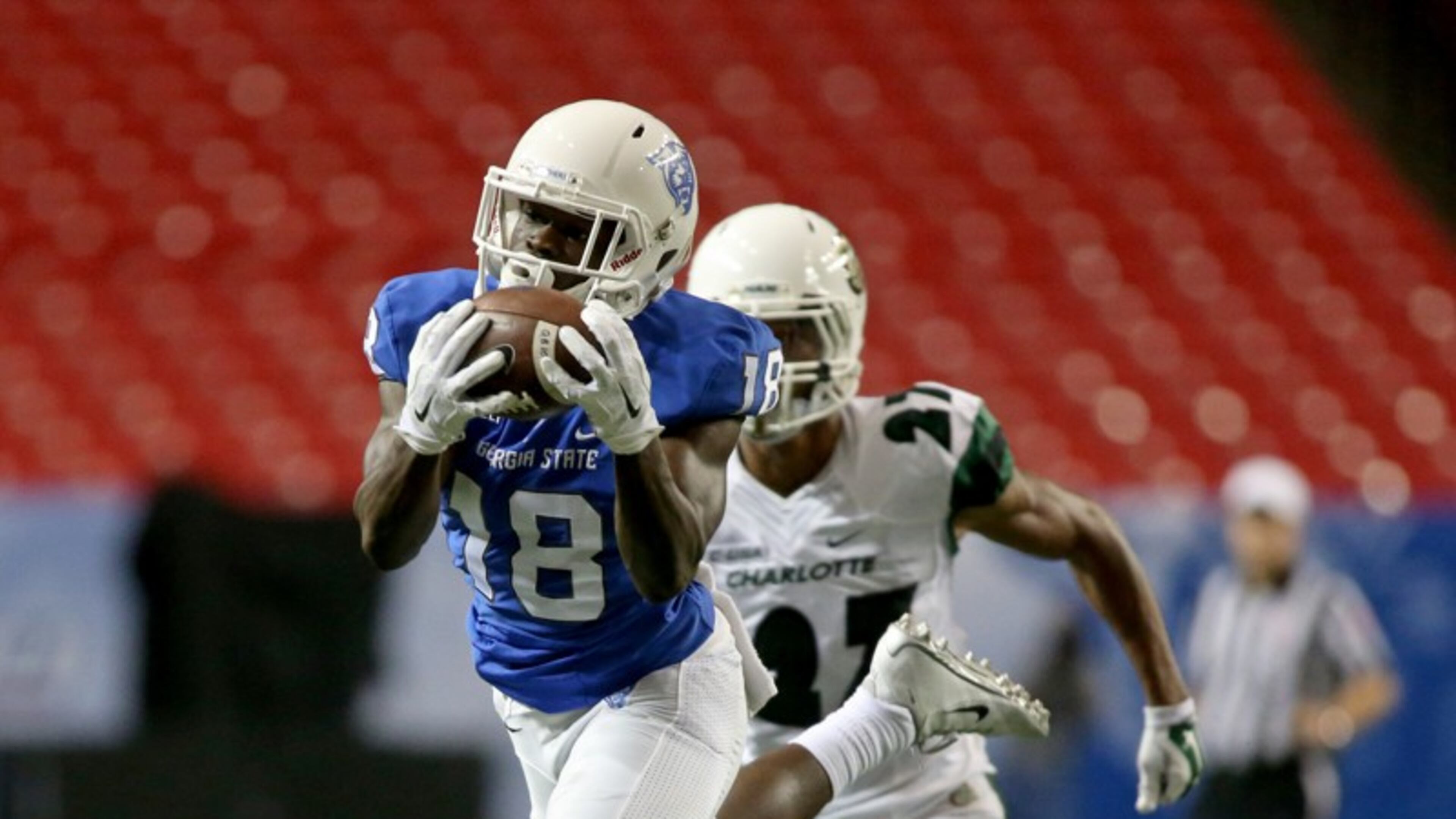 Georgia State Panthers wide receiver Penny Hart (18) catches a 53-yard touchdown pass in the fourth quarter of their game against the Charlotte 49ers at the Georgia Dome, September 4, 2015, in Atlanta. Hart is returning from a broken foot that sidelined him for most of 2016. PHOTO / JASON GETZ