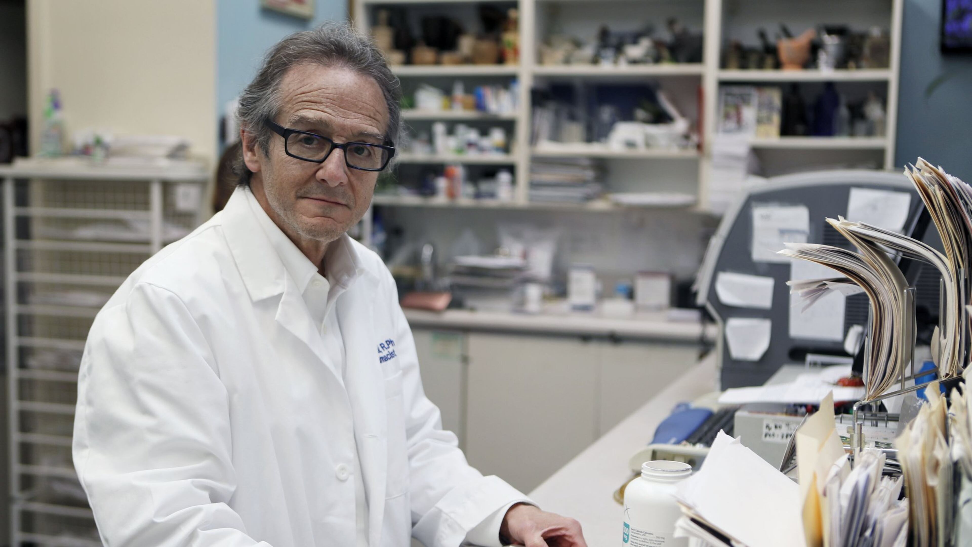 Drugstore owner Ira Katz knew what to do when he saw a young man unconscious in a car in the Little Five Points parking lot outside his pharmacy, which has been in Little Five Points for 37 years. Like Katz, regular citizens armed with Narcan are saving the lives of people who overdose on opioids. BOB ANDRES /BANDRES@AJC.COM