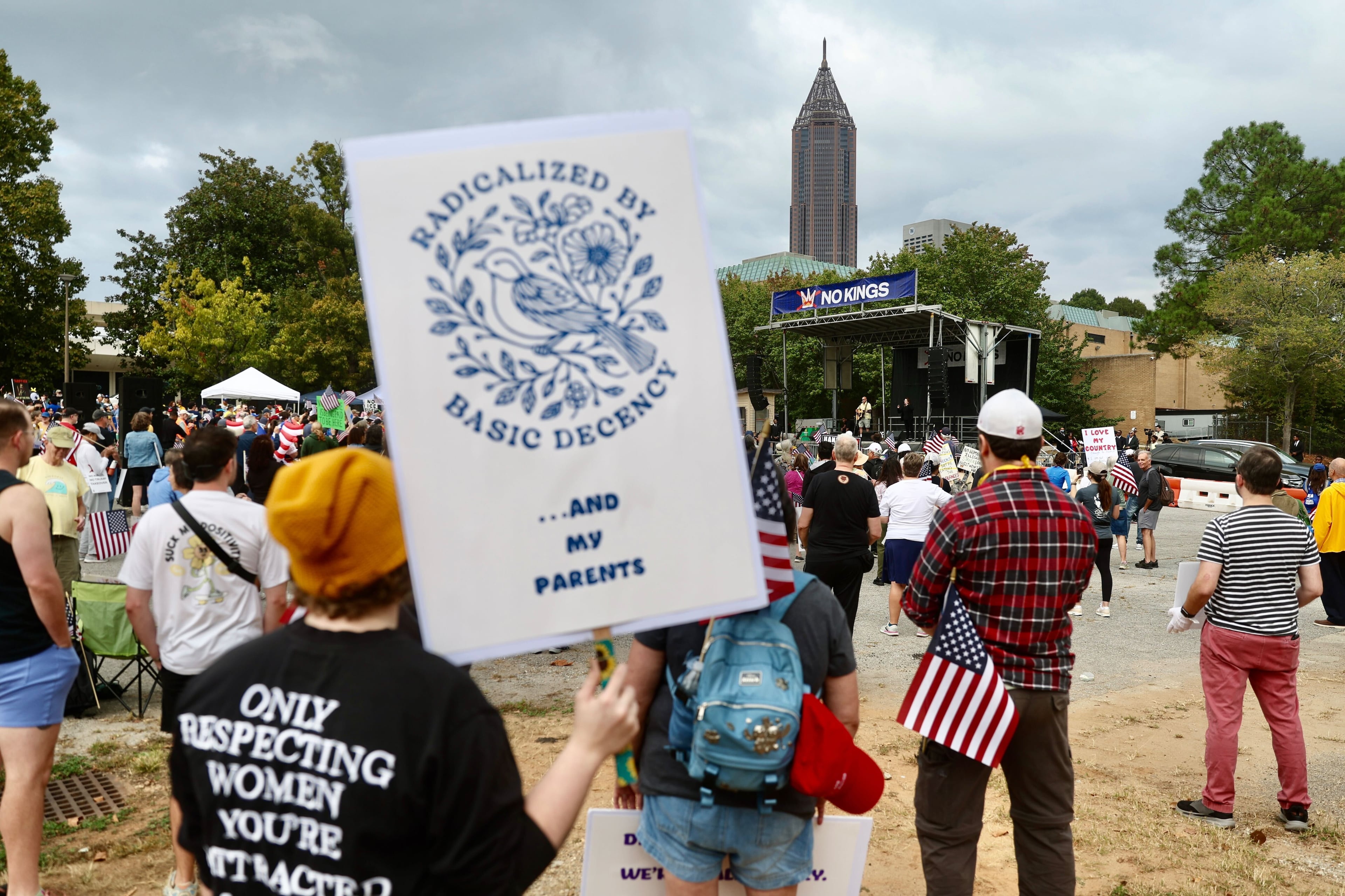 Thousands of people marched with signs at the "No Kings" protest. (Abbey Cutrer/AJC)
