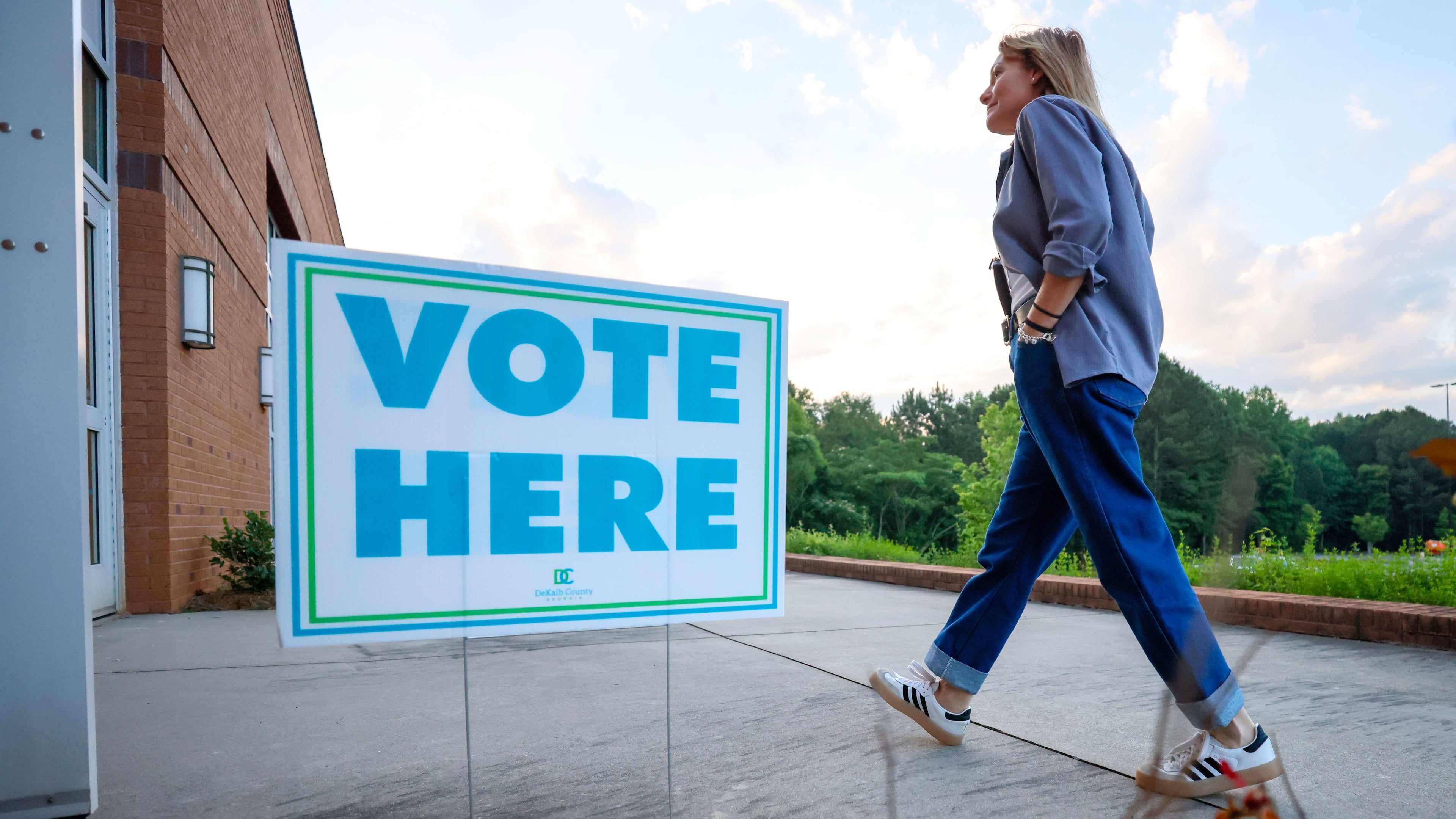 A person walks into the Beulah Community Family Life Center in Decatur after the voting polls opens for the Georgia primary elections on Tuesday, May 21, 2024. Runoff elections are set for Tuesday June 18, 2024 to decide the close races from the primary in which no candidate won a majority of the vote.
(Miguel Martinez / AJC)