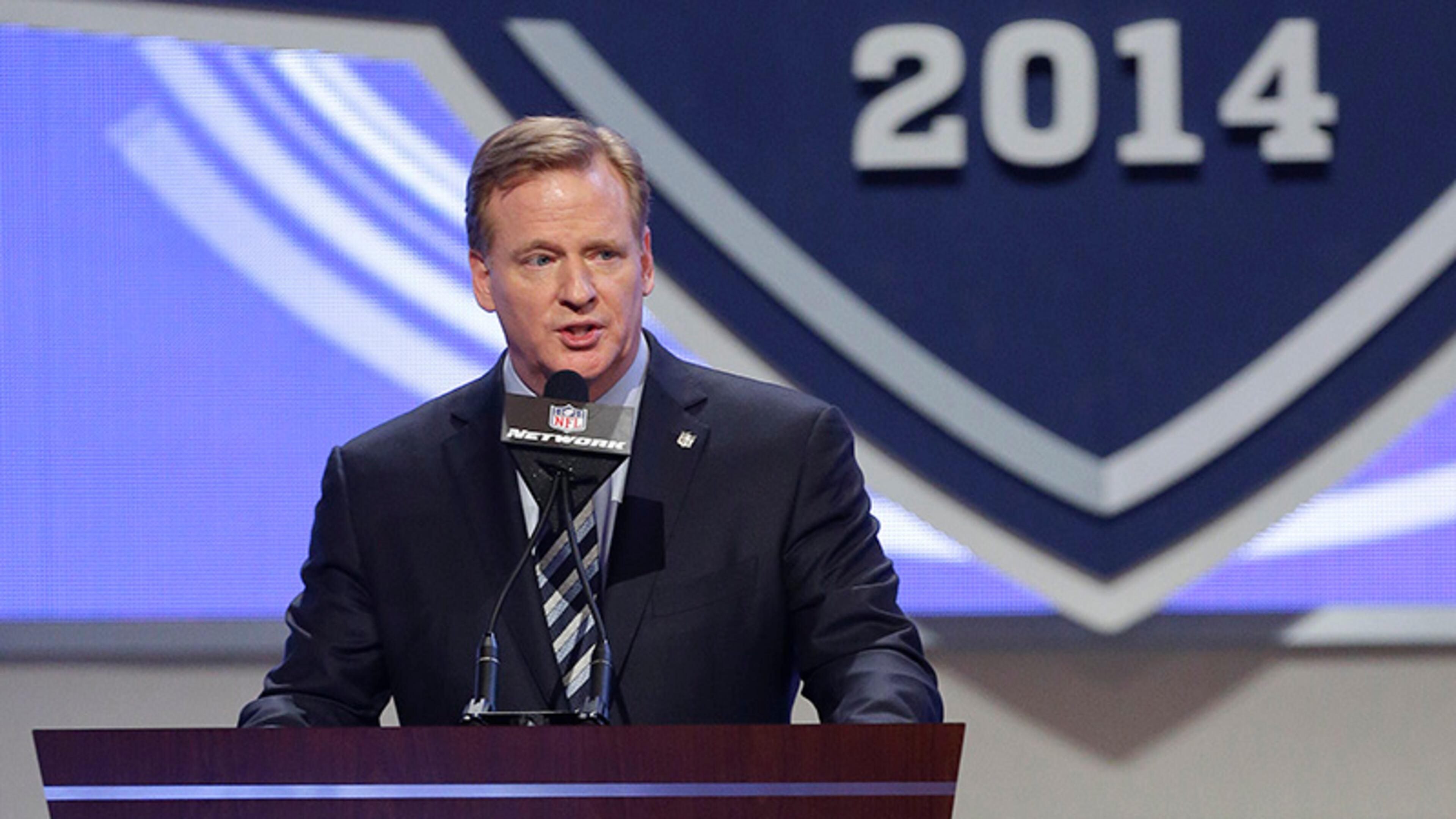 NFL commissioner Roger Goodell announces the start of the first round of the 2014 NFL Draft, Thursday, May 8, 2014, in New York.