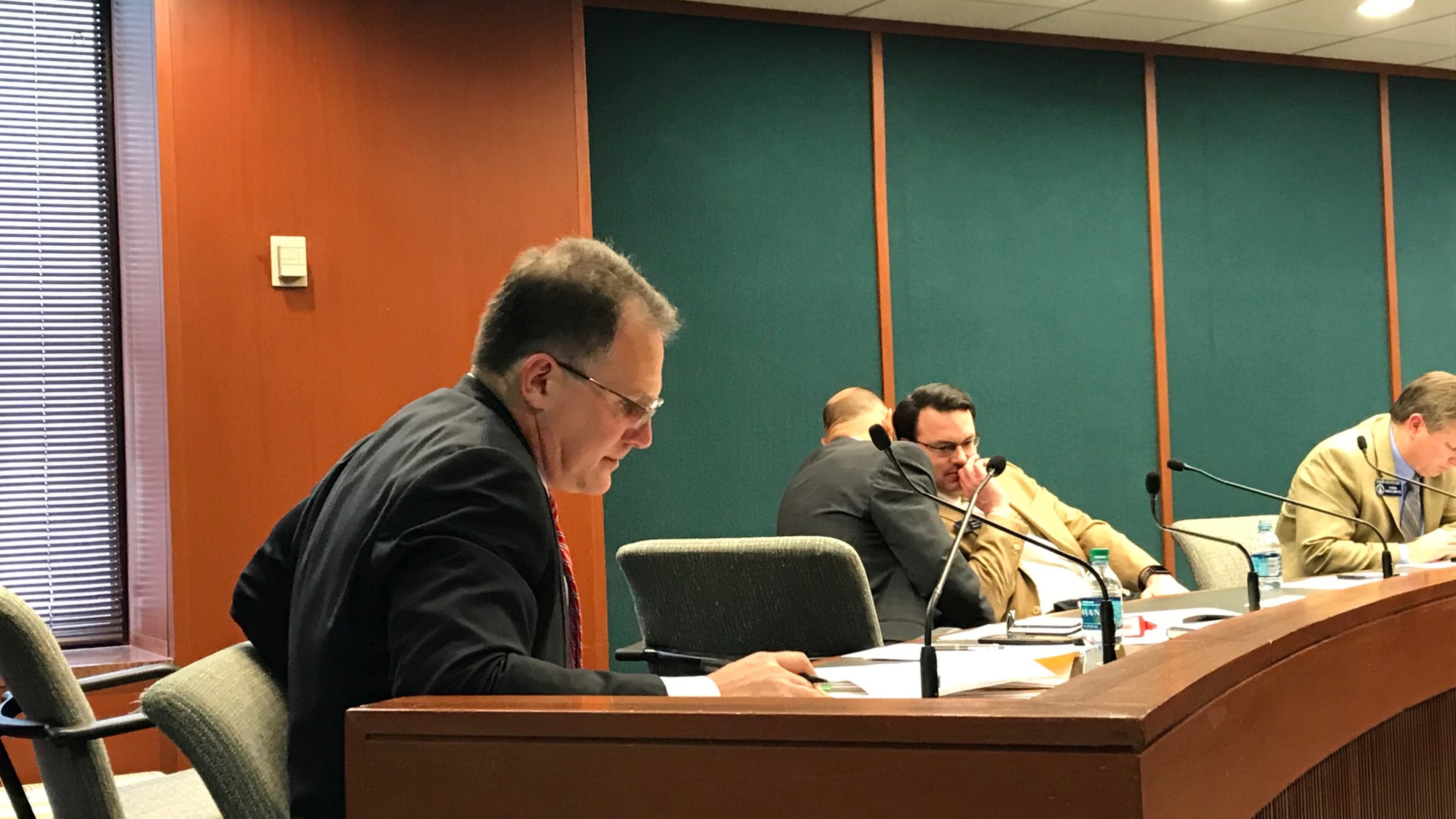 State Sen. William Ligon, R-Brunswick, takes notes as members of the senate’s higher education committee discuss his legislation, which he believes will protect the rights of people invited to speak on college campuses. AJC FILE PHOTO