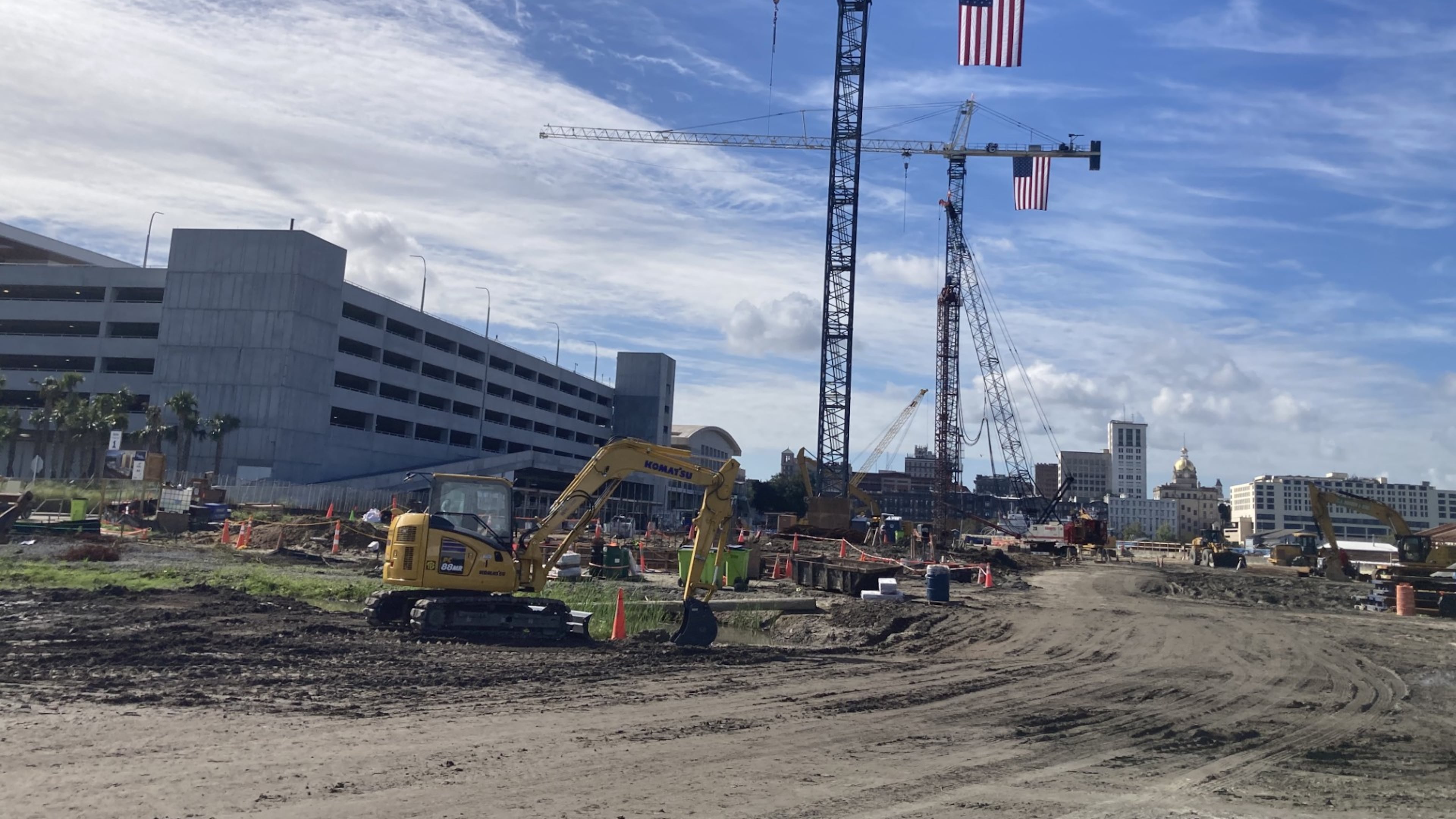 Cranes and construction equipment are poised to turn this worksite into a 444-room Signia by Hilton Hotel next to the Savannah Convention Center. (Adam Van Brimmer/AJC)