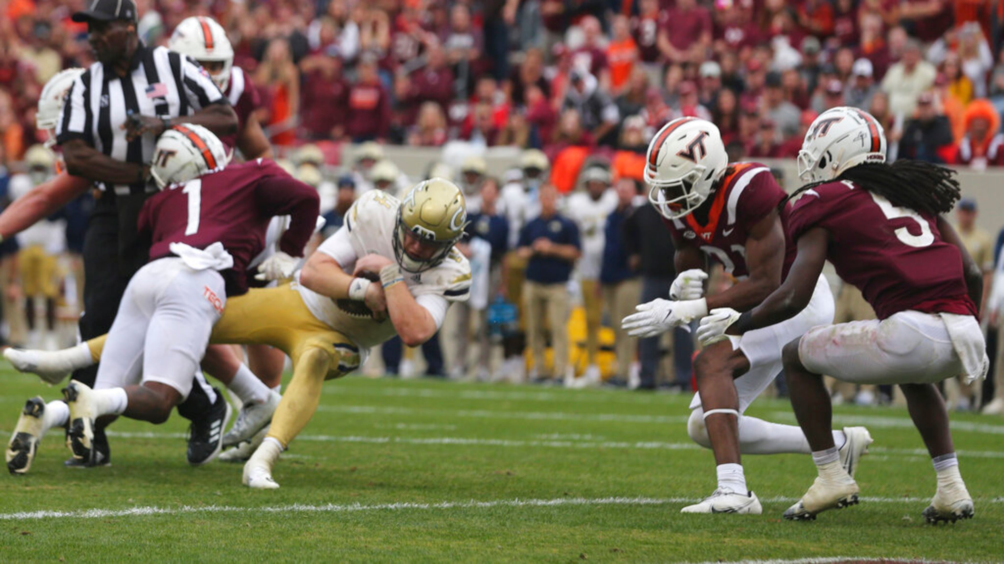 Georgia Tech quarterback Zach Pyron scores a touchdown in the second half Saturday against Virginia Tech in Blacksburg, Va. (Matt Gentry/The Roanoke Times via AP)