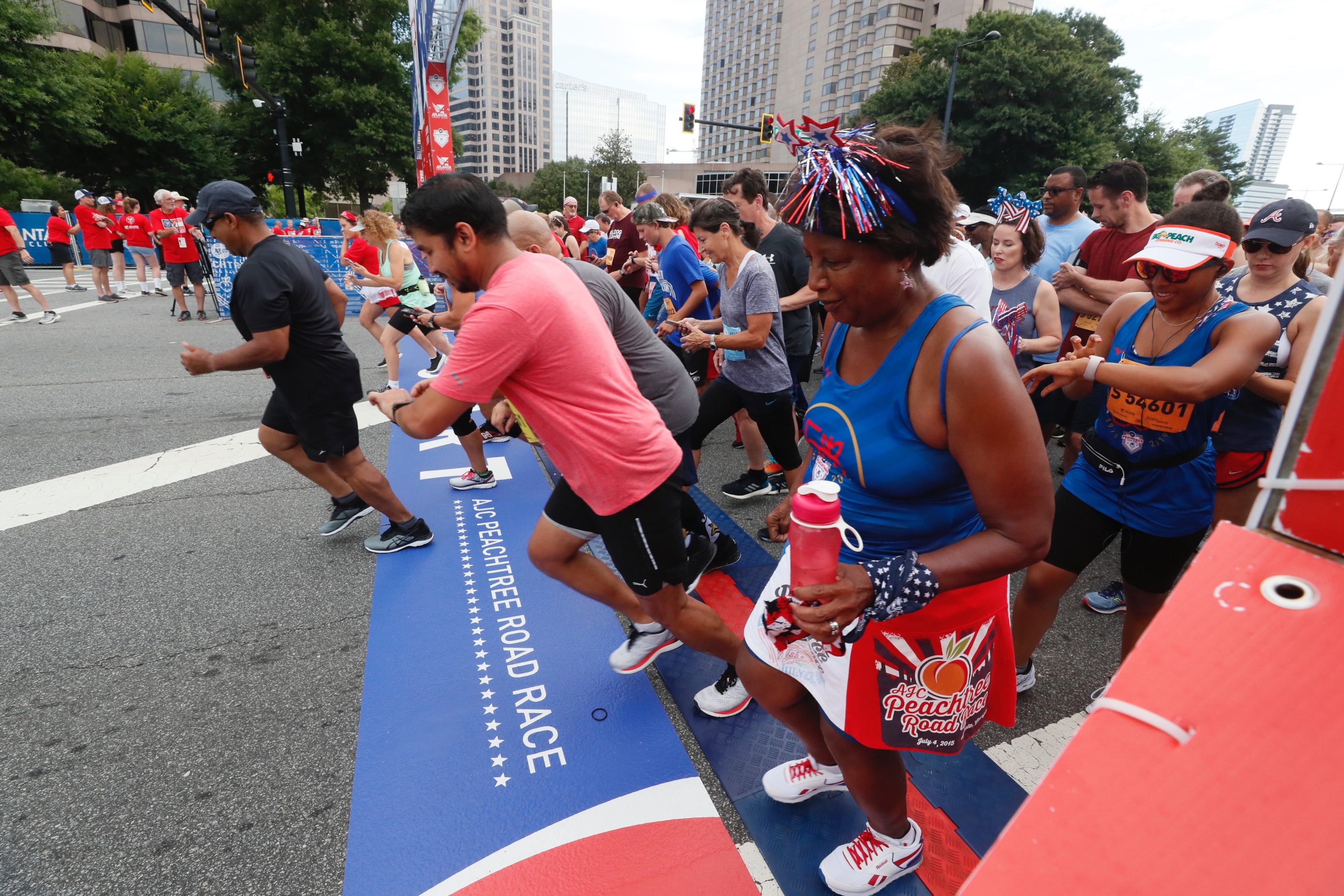 Runners at the start line of the AJC Peachtree Road Race on Thursday, July 4, 2019.