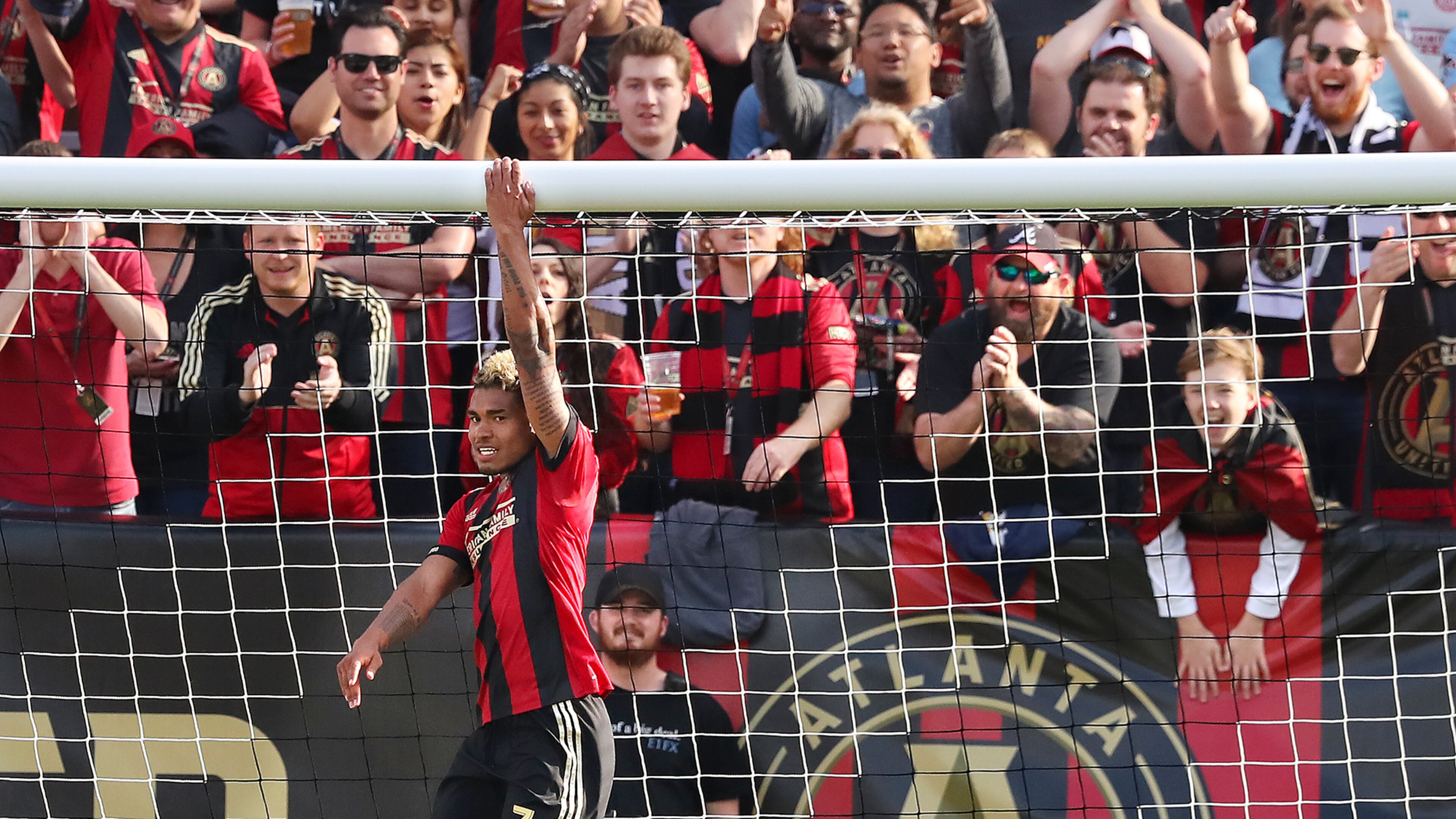 Atlanta United forward Josef Martinez hangs on the Chicago Fire goal after just missing a score during the second half of their MLS game on Saturday, March 18, 2017, in Atlanta. Martinez scored two goals during the 4-0 victory over the Chicago Fire. Curtis Compton/ccompton@ajc.com
